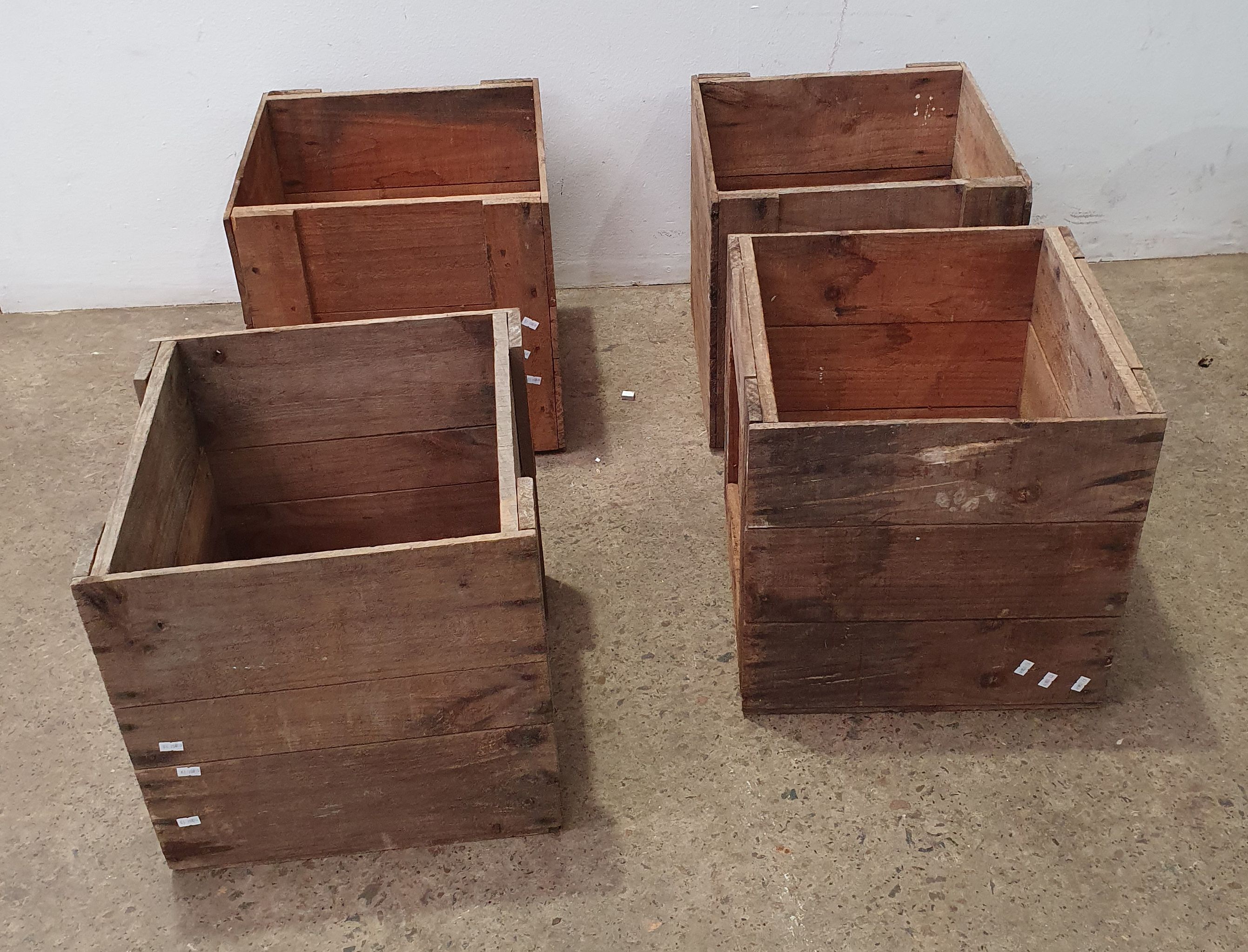 1137 · A GROUP OF FOUR WOODEN CRATES