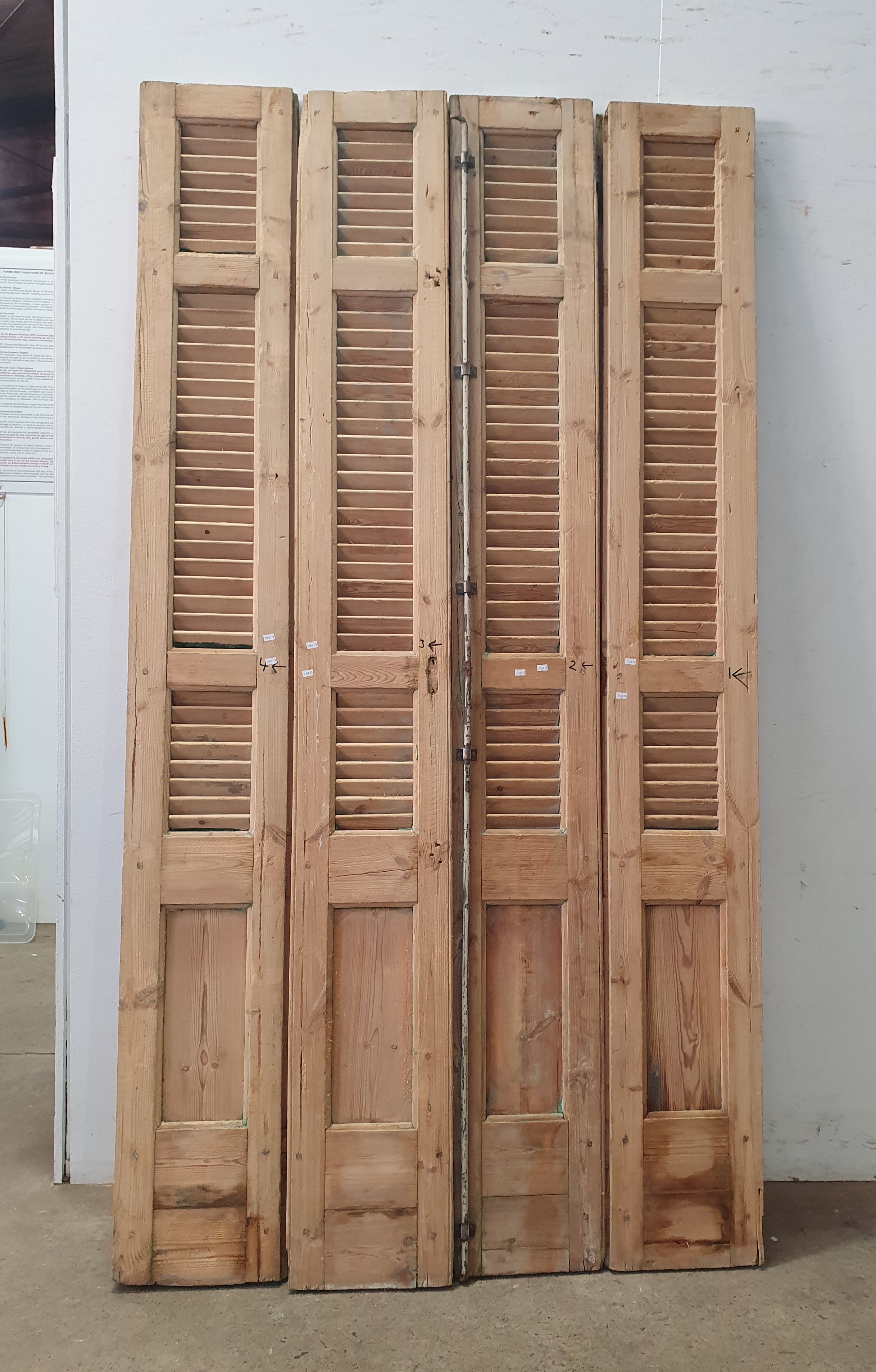 A Set Of Four Rustic Shutters