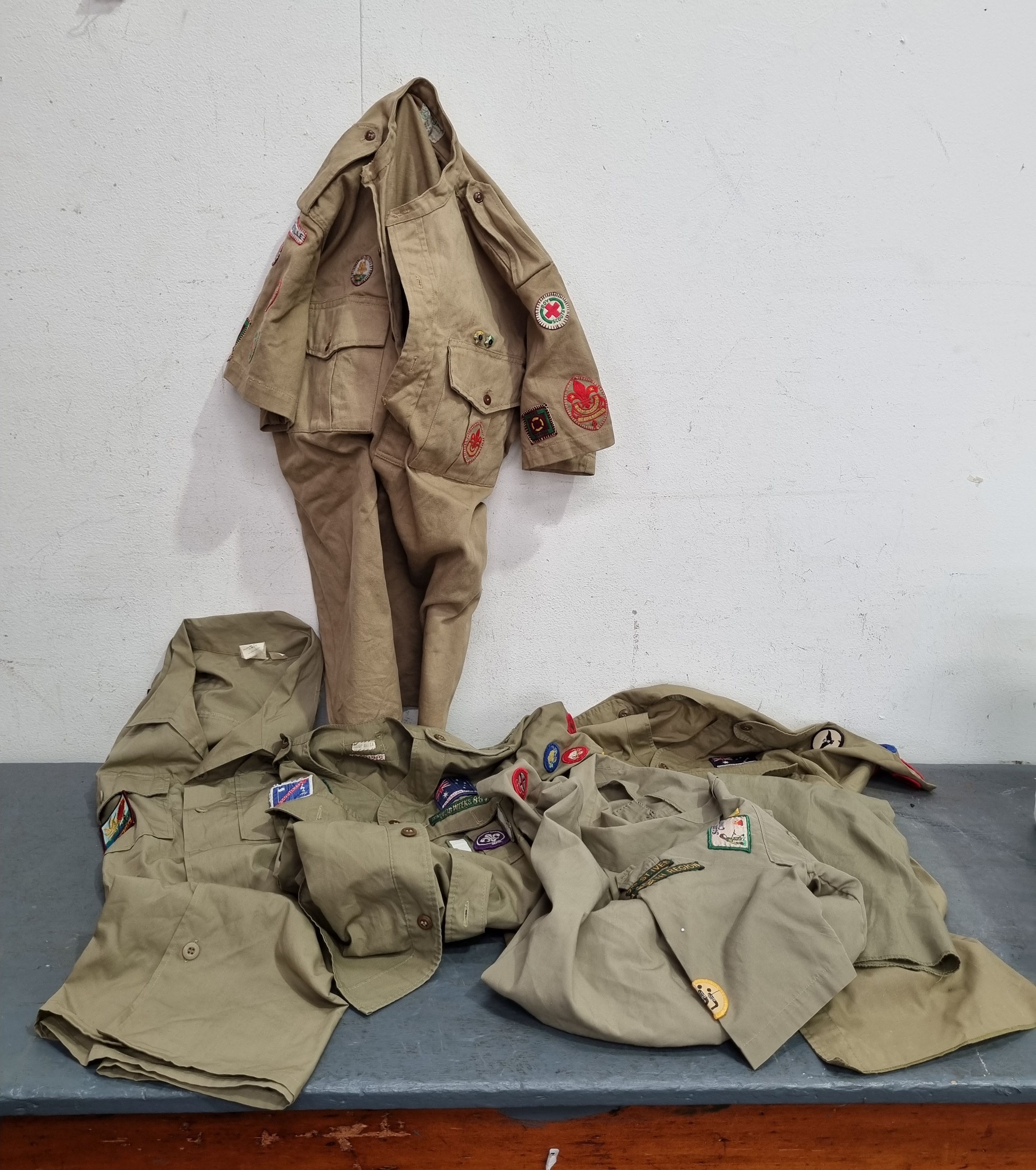 A BOX OF ARMY CLOTHES