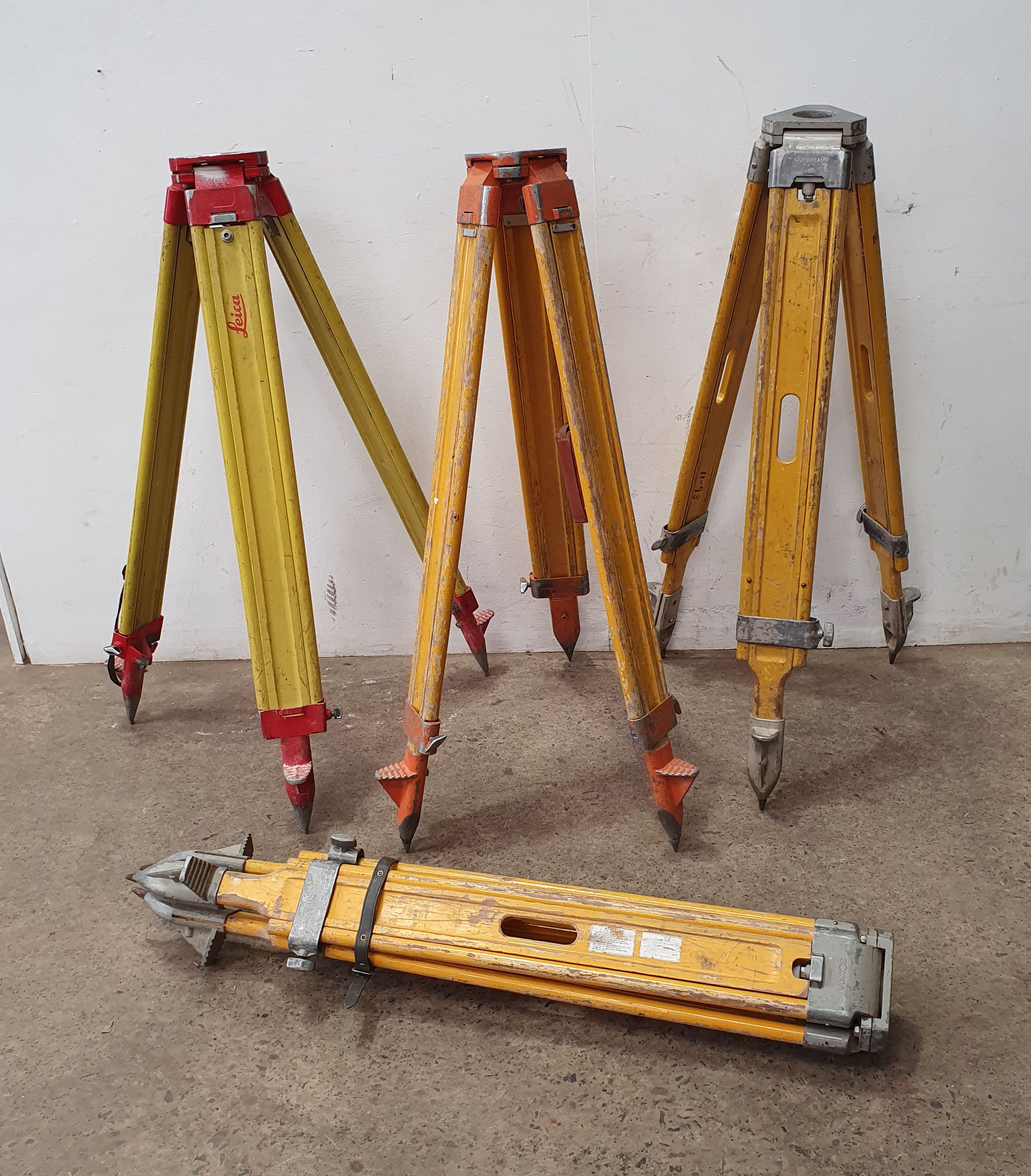 Four Surveyors Tripods