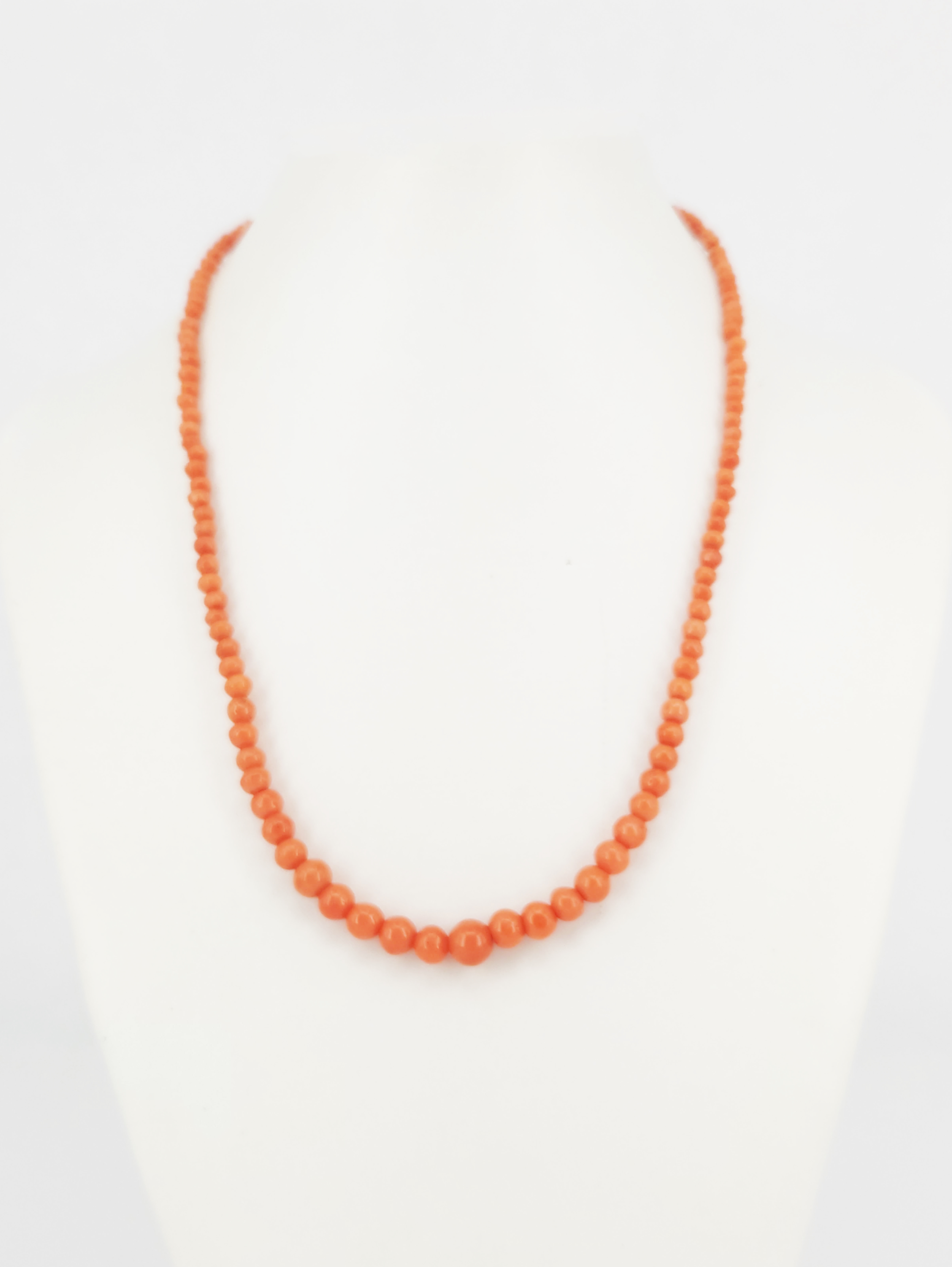 A Graduated Coral Bead Necklace