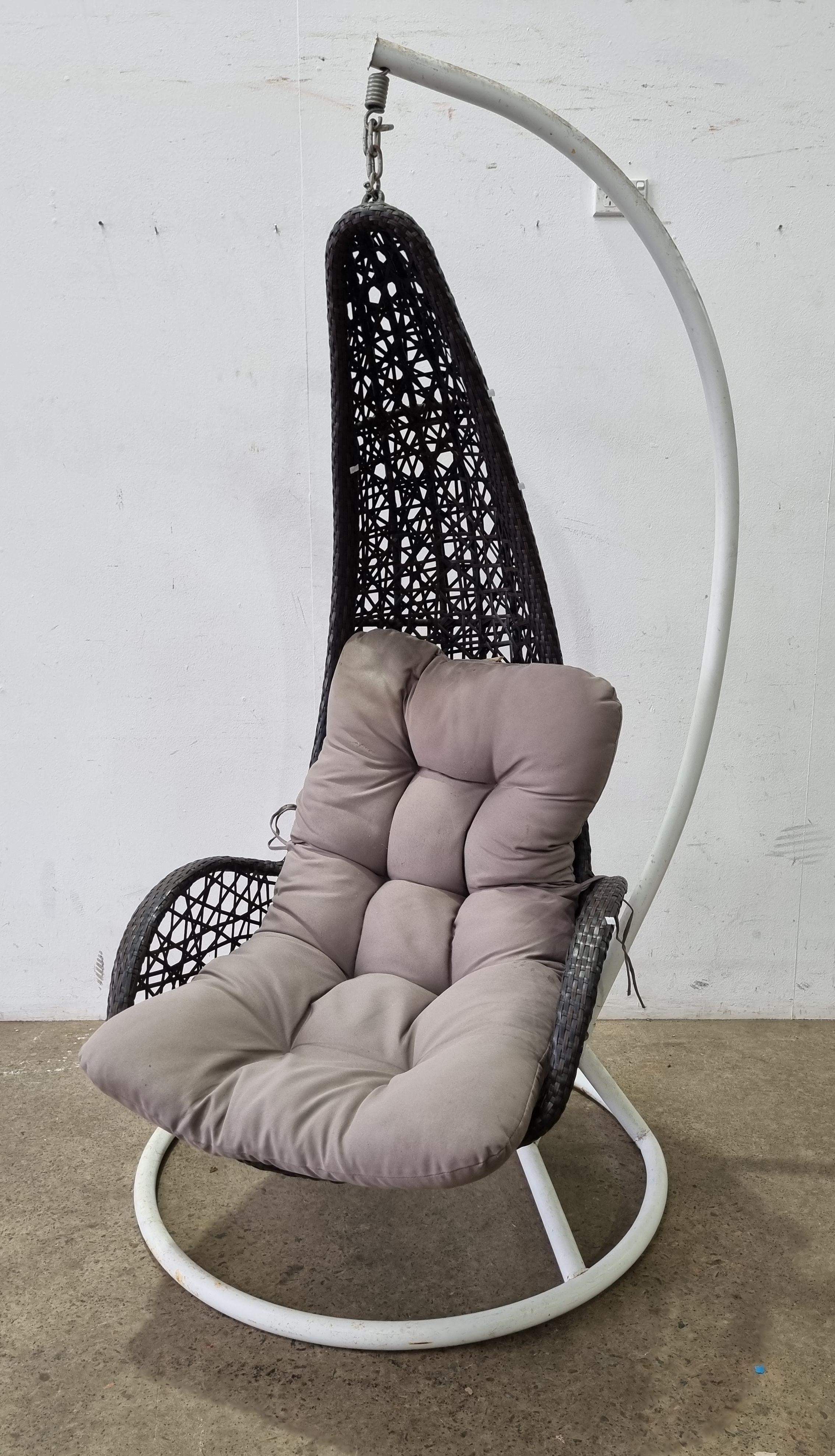 1061 · A FAUX WICKER HANGING CHAIR