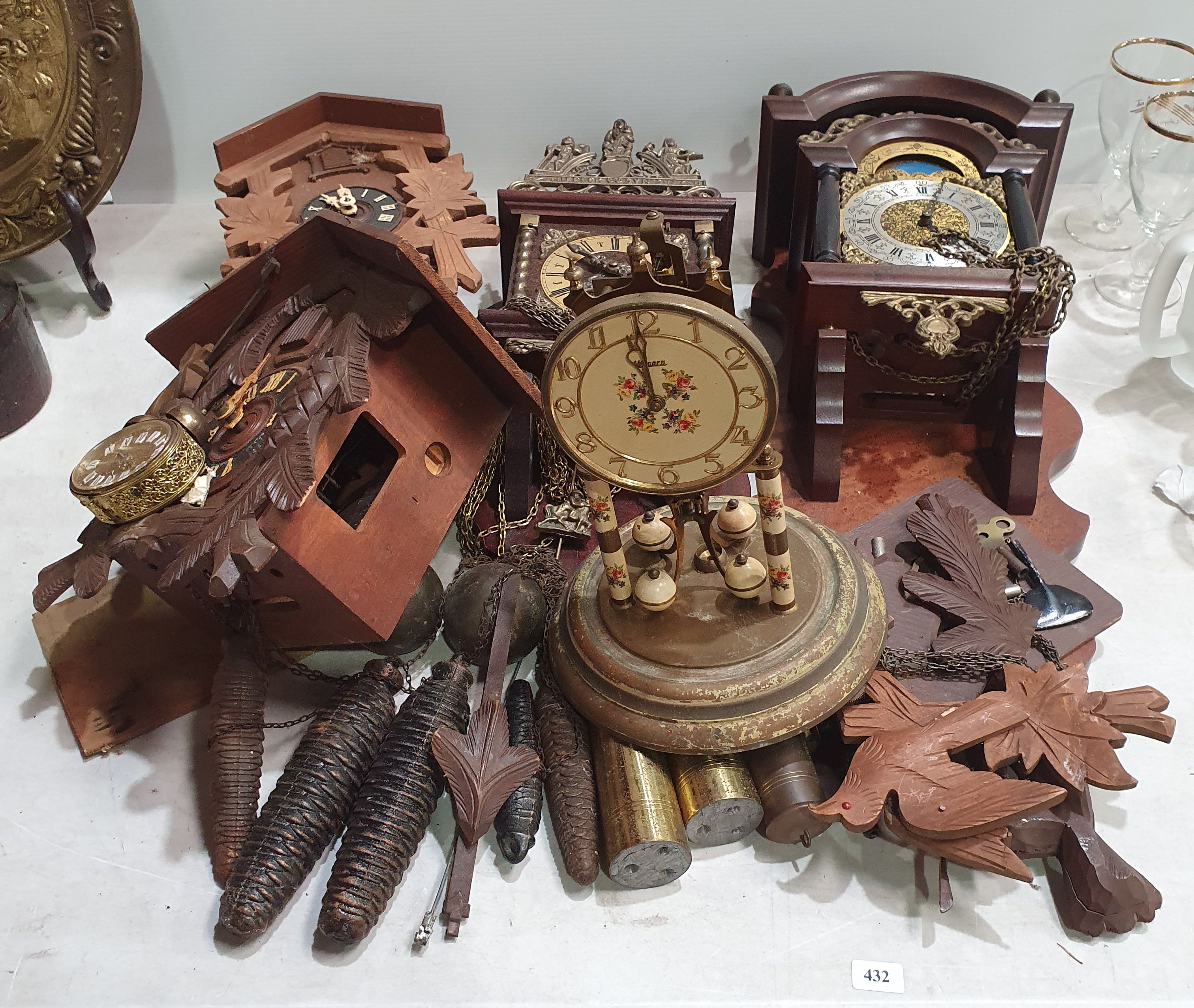 A COLLECTION OF CLOCKS AND PARTS
