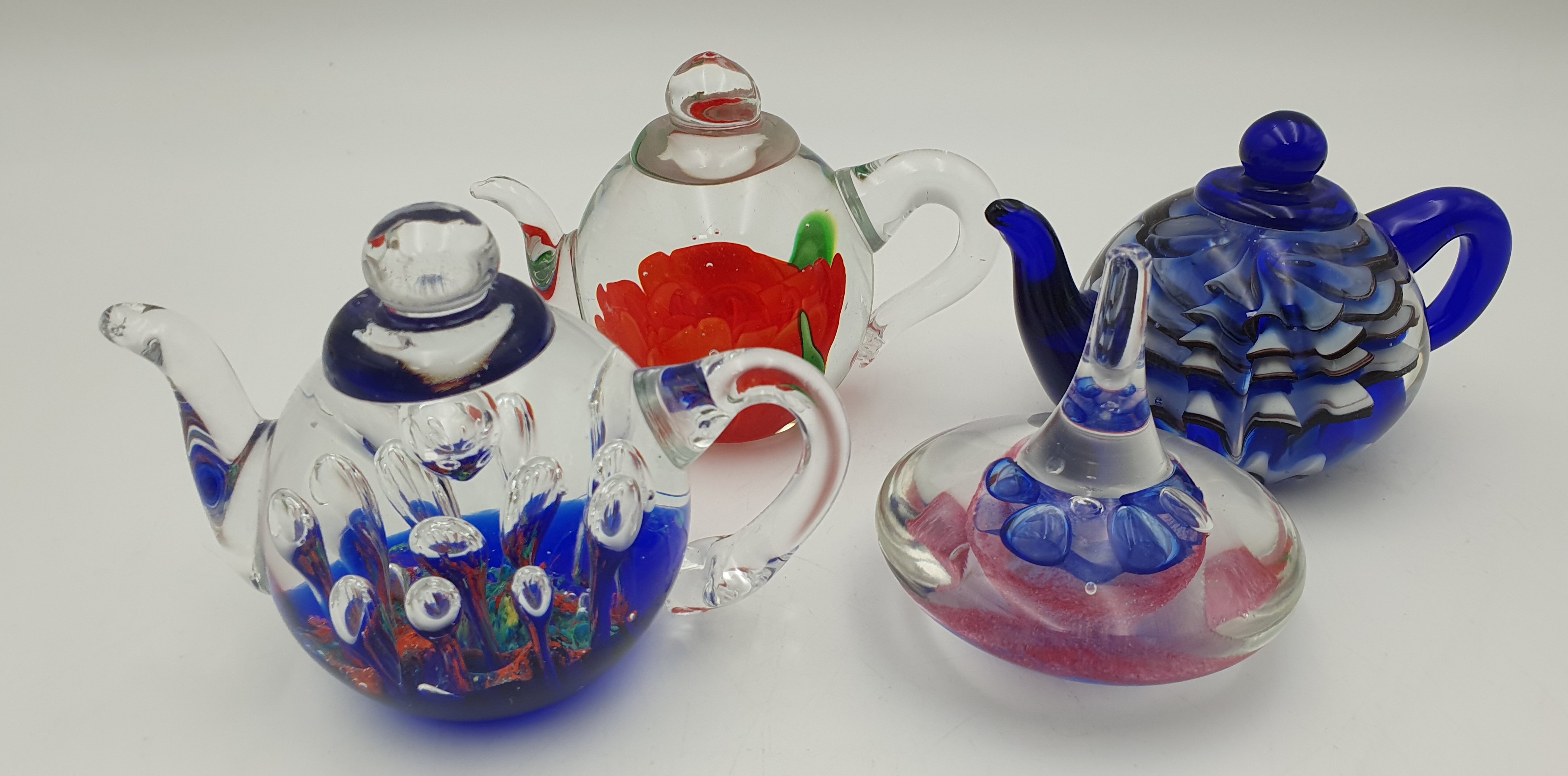 513 · FOUR GLASS PAPERWEIGHTS