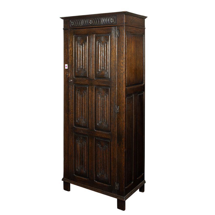 A Spanish Revival oak cabinet
