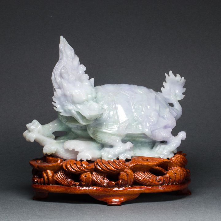 Chinese green and lavender jadeite carving of a mythical beast