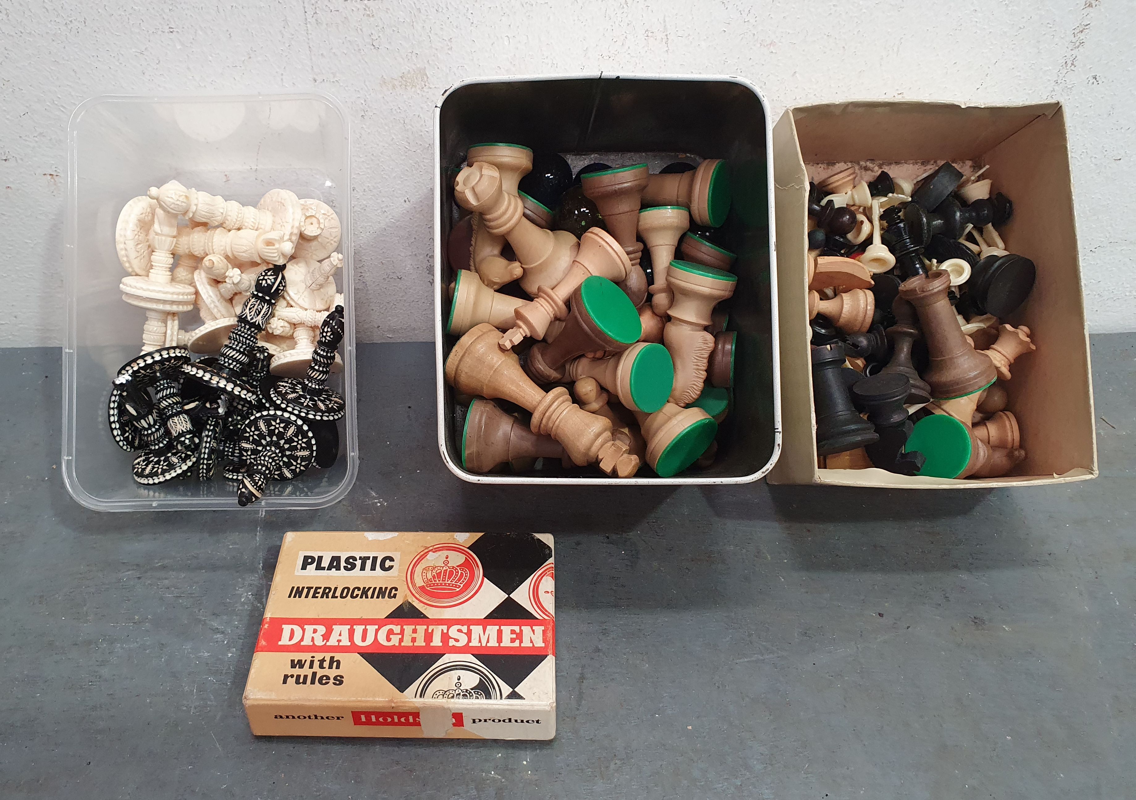 A GROUP OF VARIOUS CHESS AND DRAUGHTS PIECES