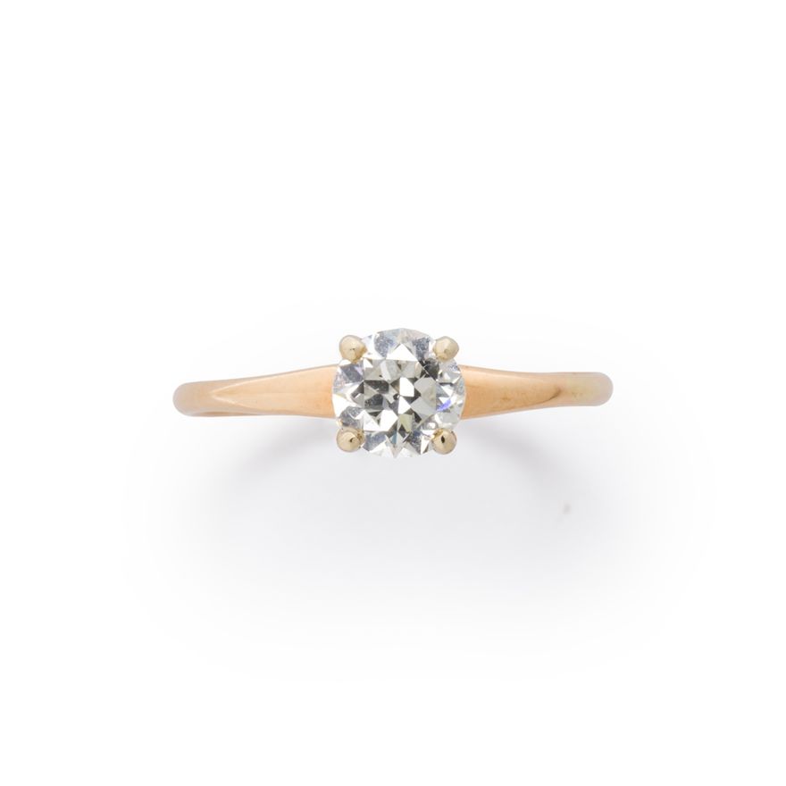 A diamond and fourteen karat gold ring