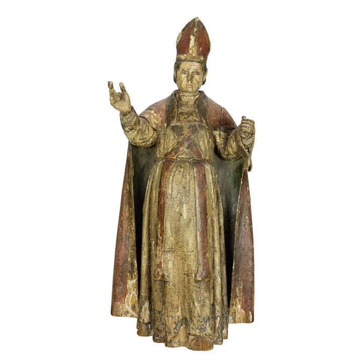 A large Continental carved and polychrome figure of a pontiff