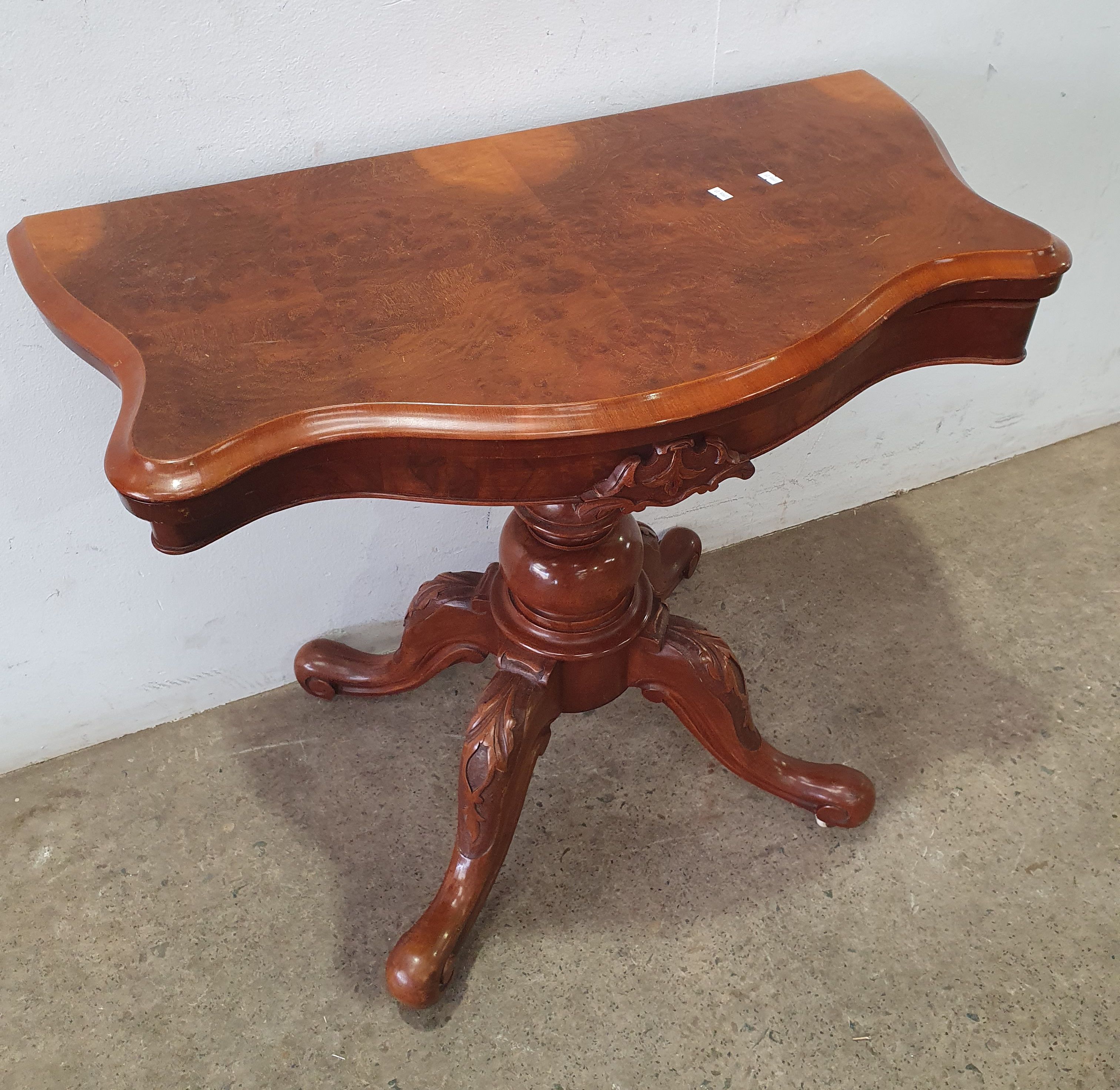 2029 · A VICTORIAN BURR WALNUT FOLD OVER CARD TABLE