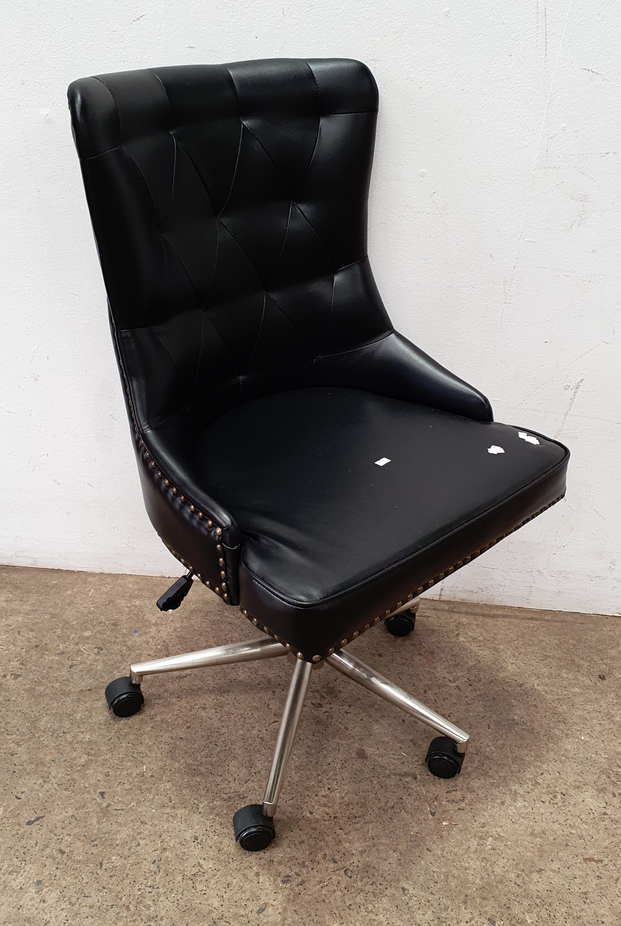 A Unique Vinyl Studded Office Chair