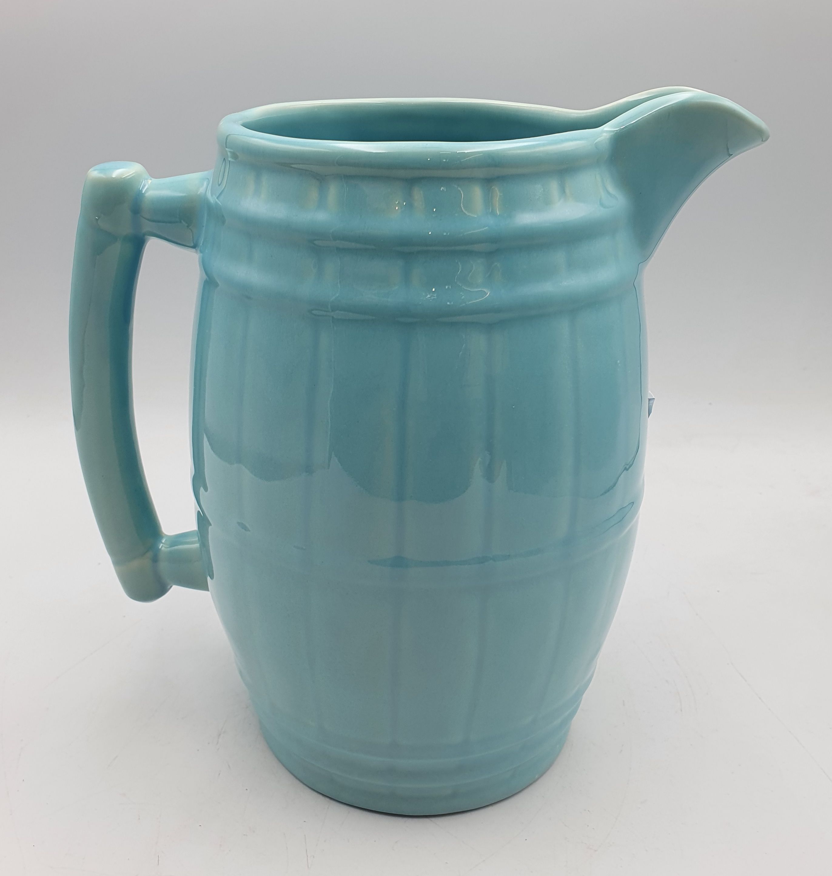 116 · AN UNMARKED MCP AQUA JUG FORM VASE