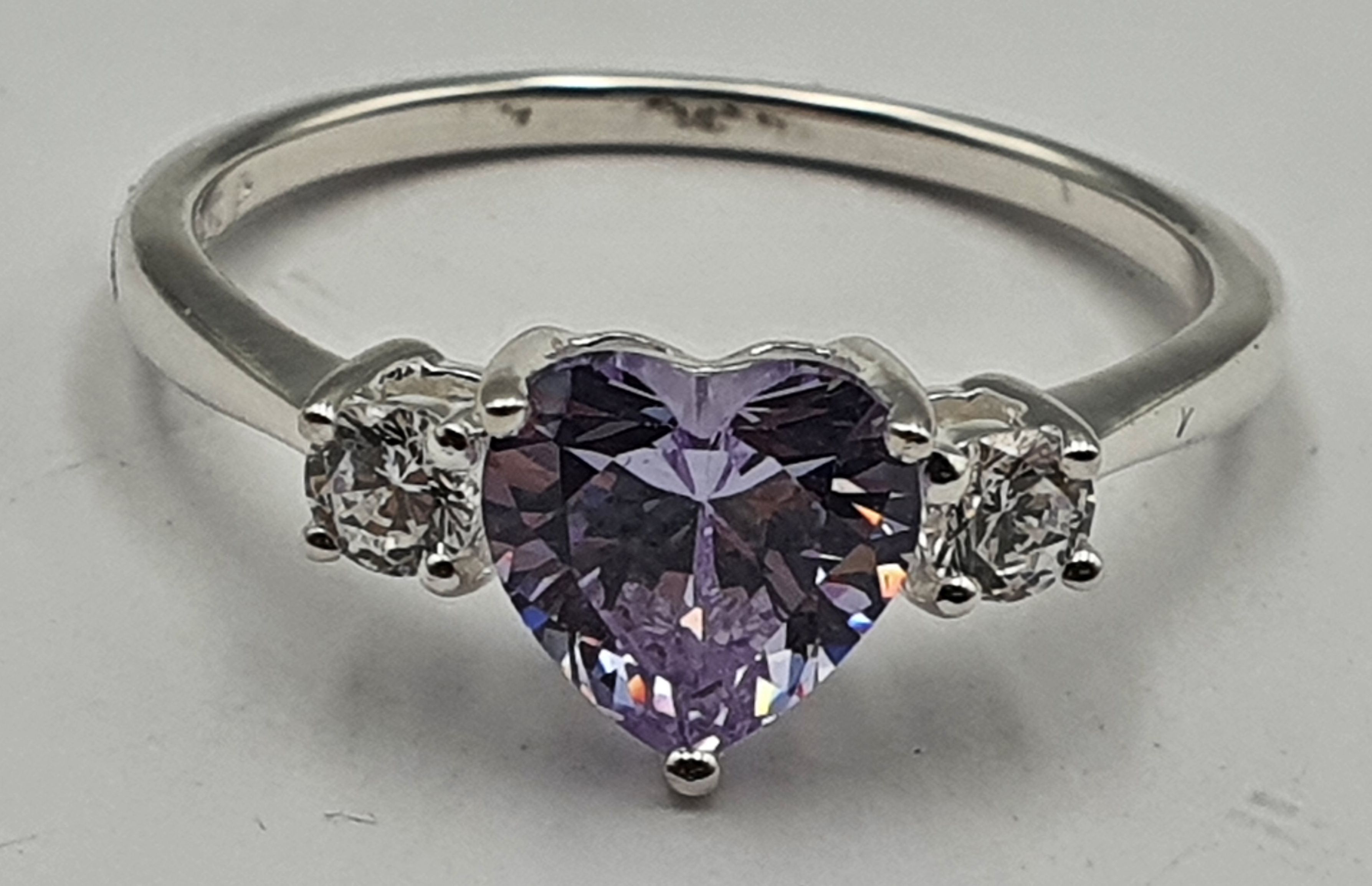 290 · A VIOLET TOURMALINE AND STERLING SILVER RING