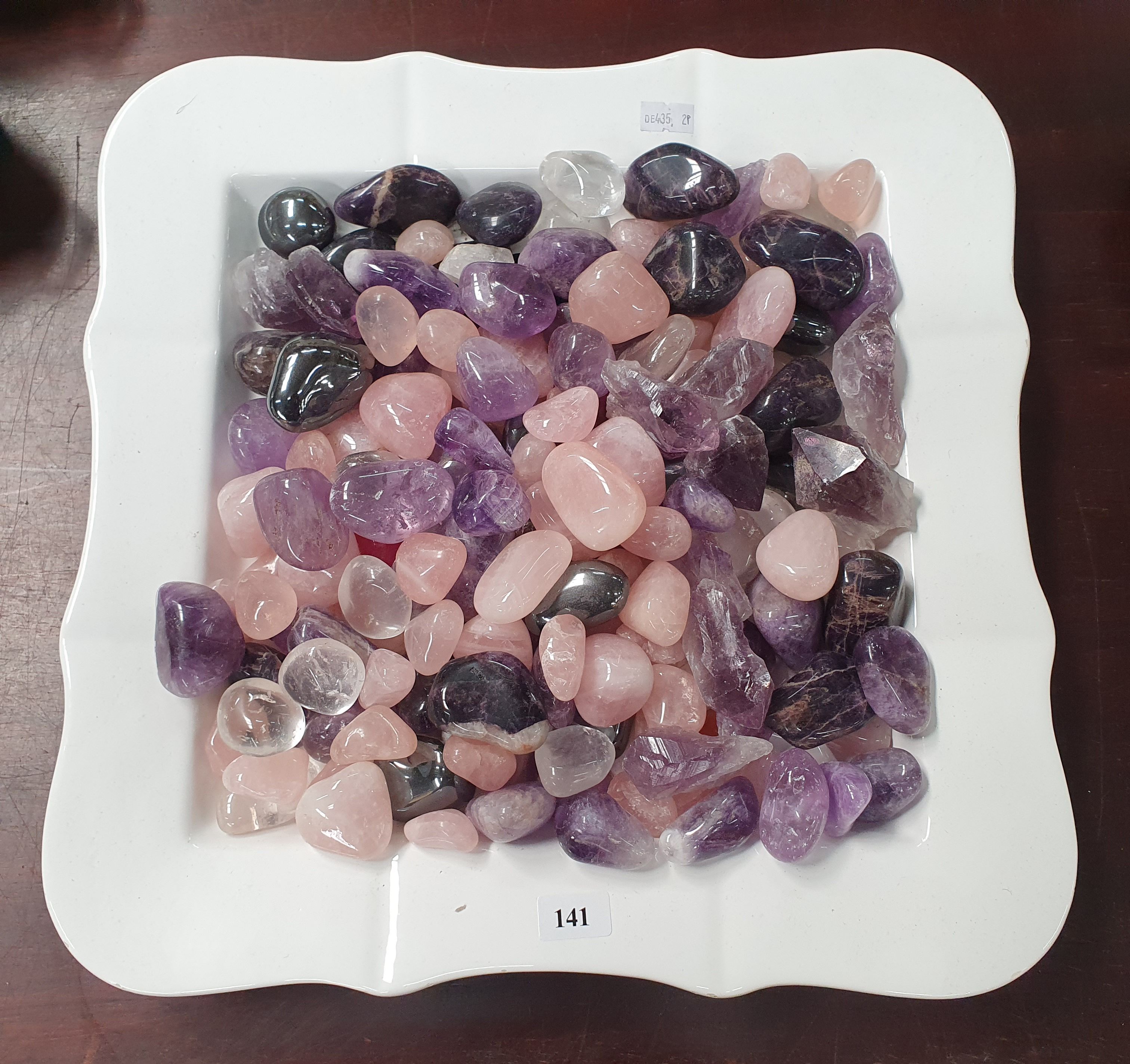 141 · A COLLECTION OF POLISHED CRYSTALS