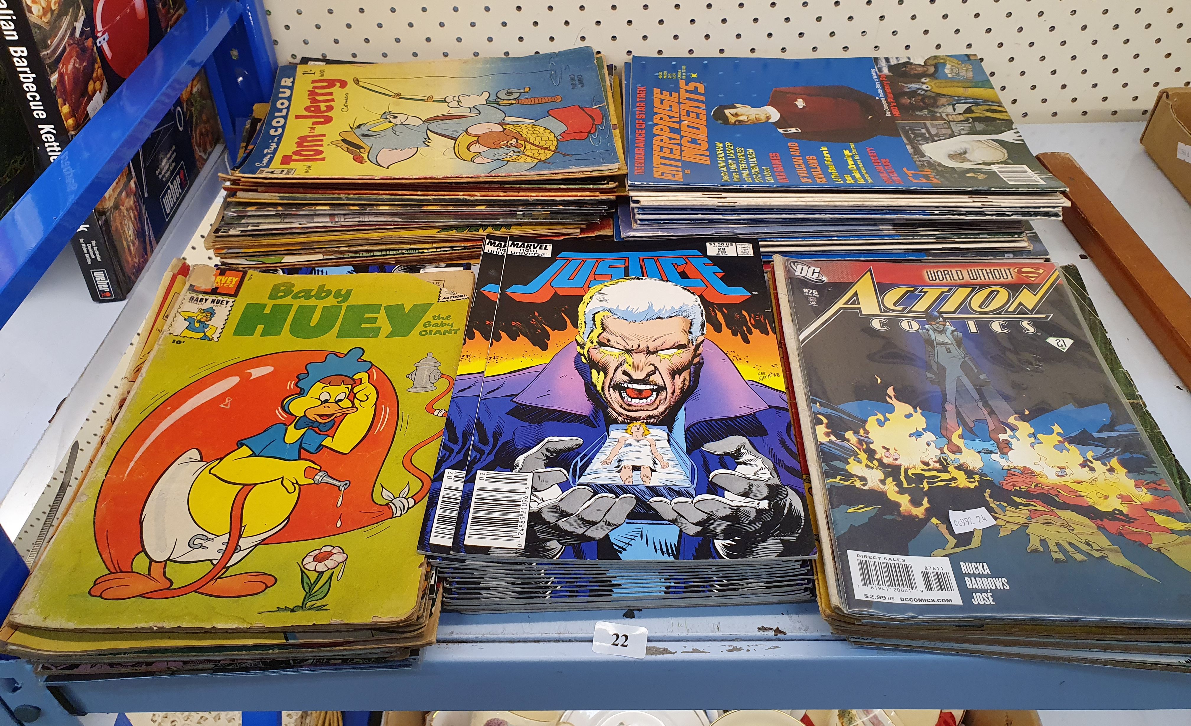 22 · A GROUP OF COMICS