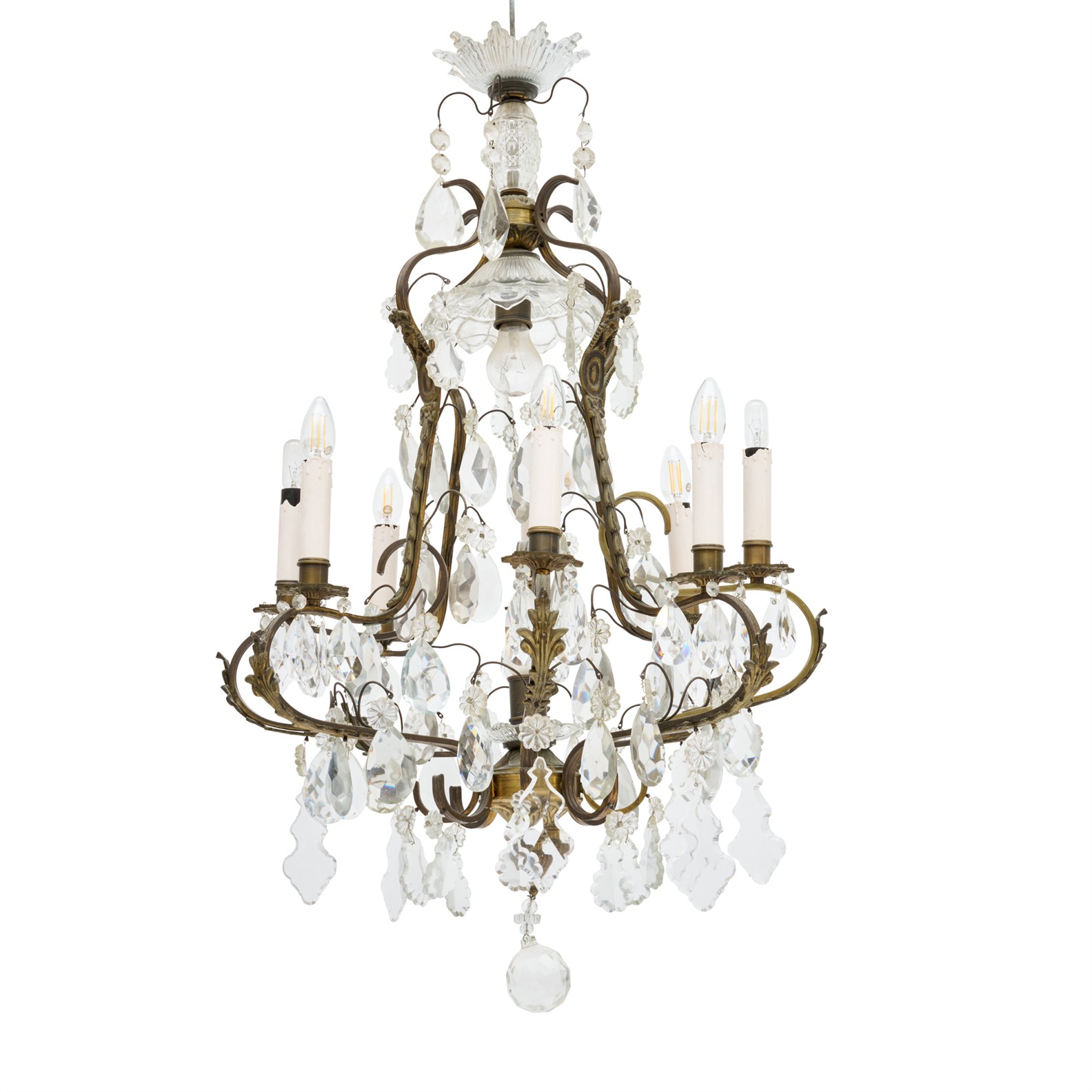 A LOUIS XV STYLE BRASS FRAMED EIGHT BRANCH CHANDELIER