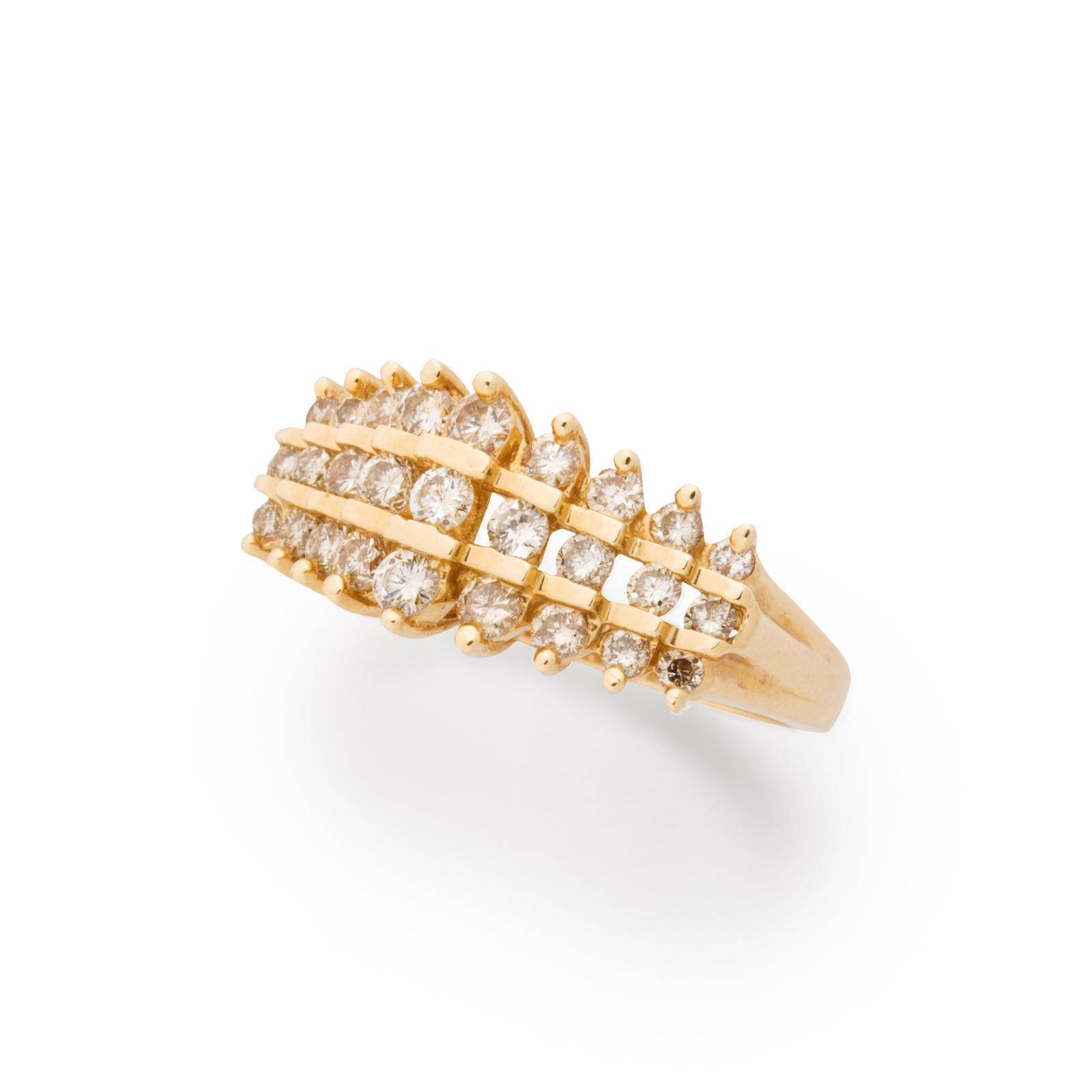 A diamond and fourteen karat gold ring | Clars Auction Gallery