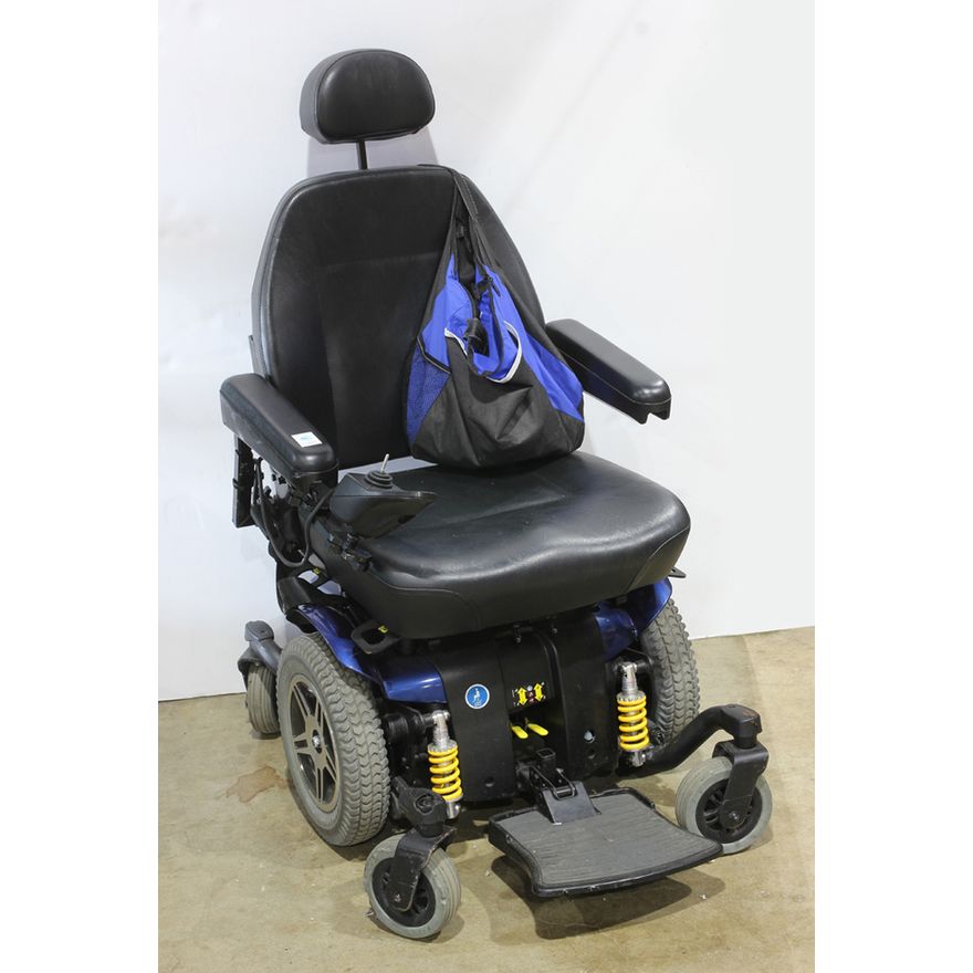 Jazzy electric wheelchair with charger