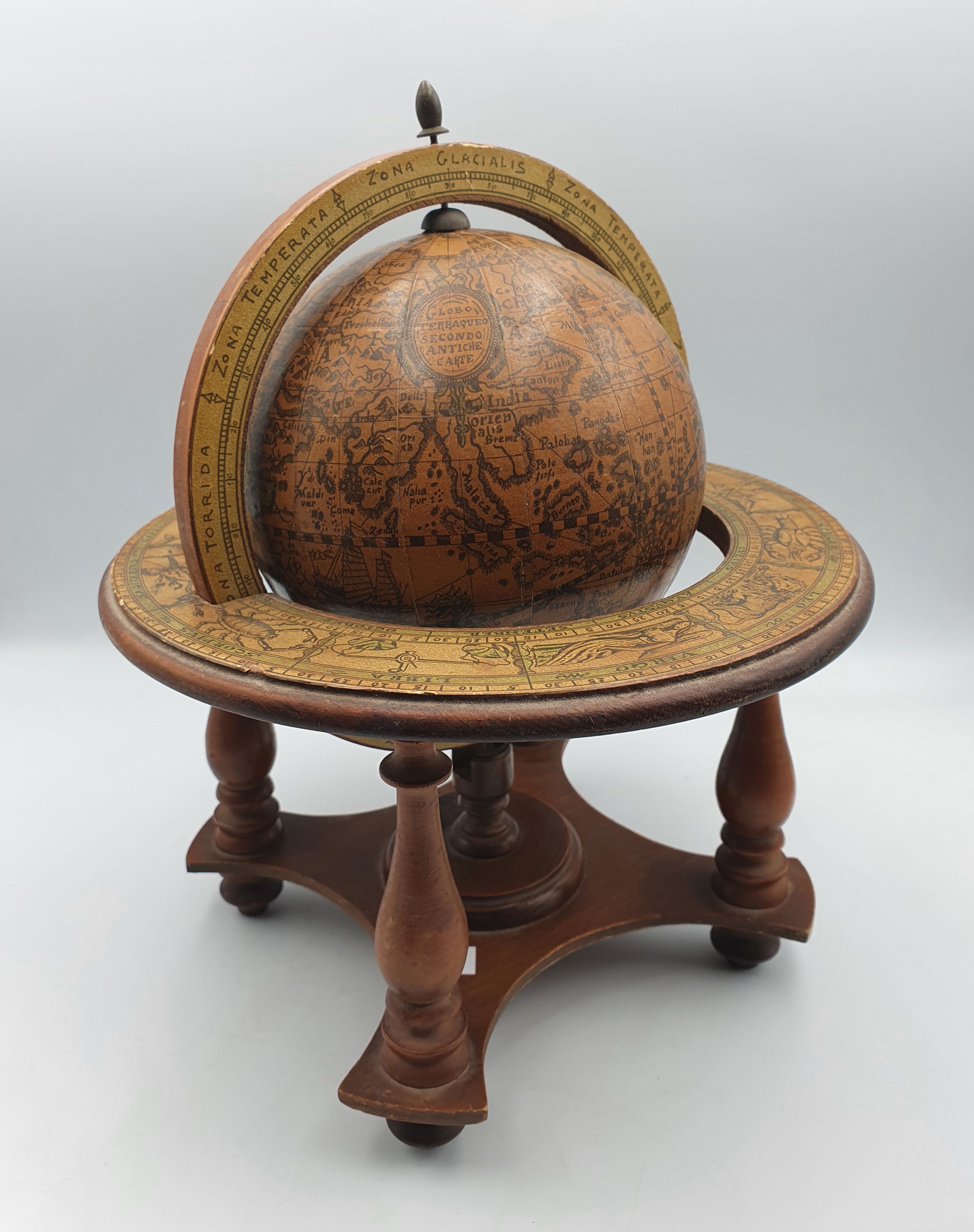 109 · AN ITALIAN DECORATIVE WORLD GLOBE ON A STAND