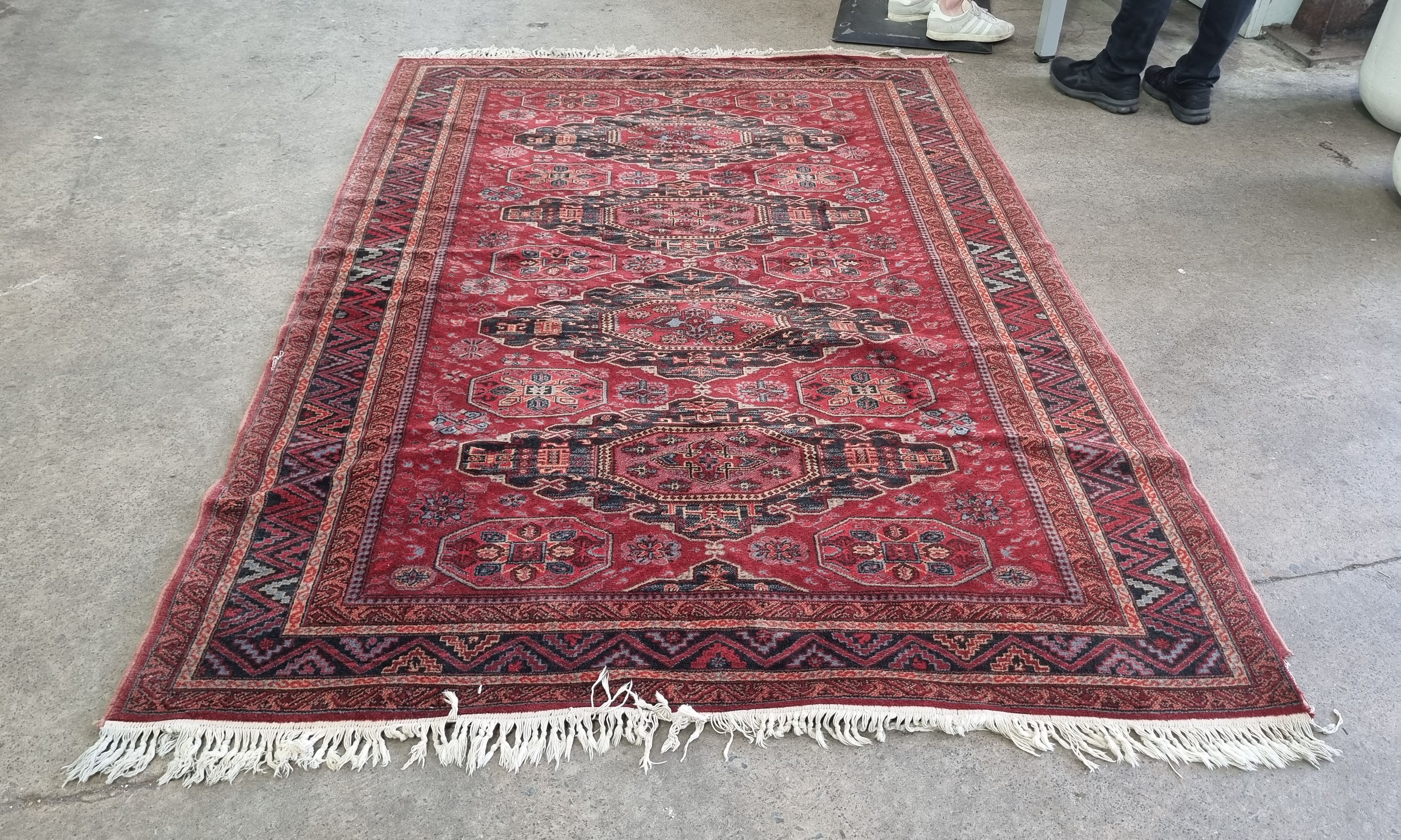 2030 · A HAND KNOTTED WOOL RUG
