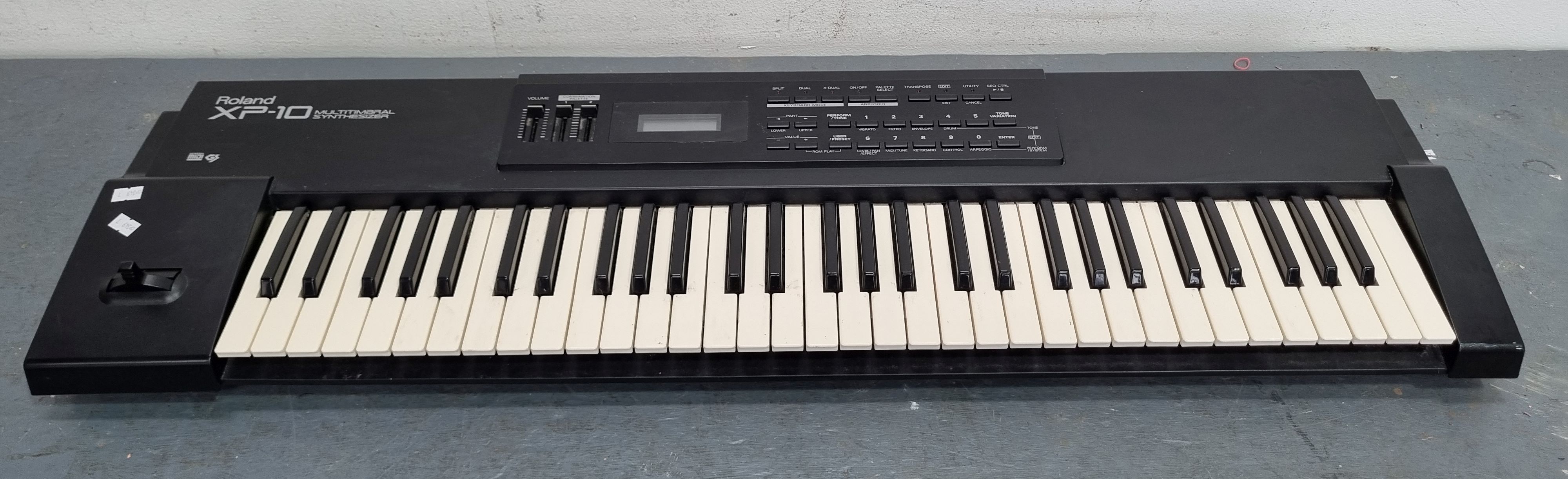 A Roland Xp-10 Synthesiser Electric Keyboard