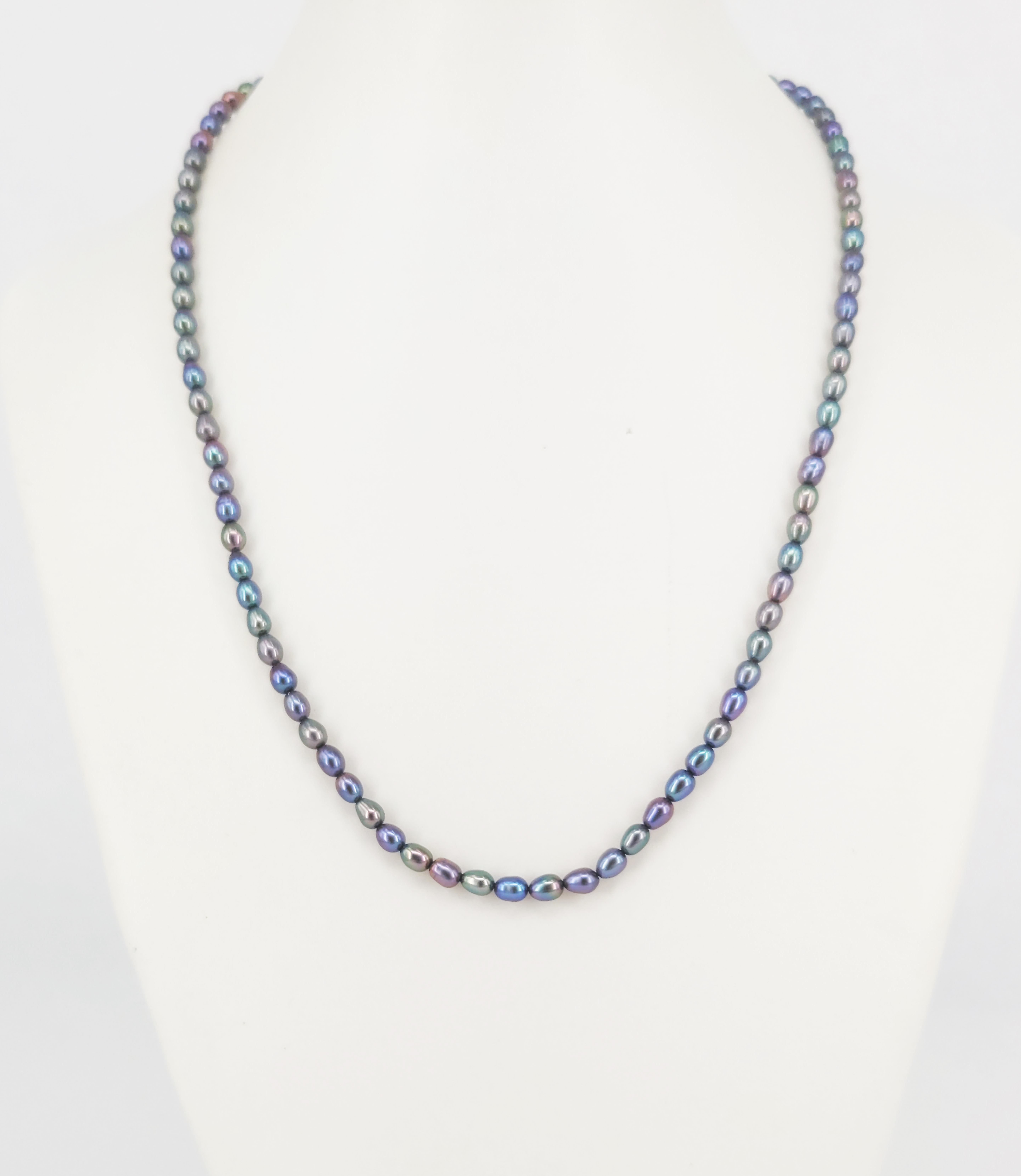 An Oval Black Pearl And 14ct Gold Necklace