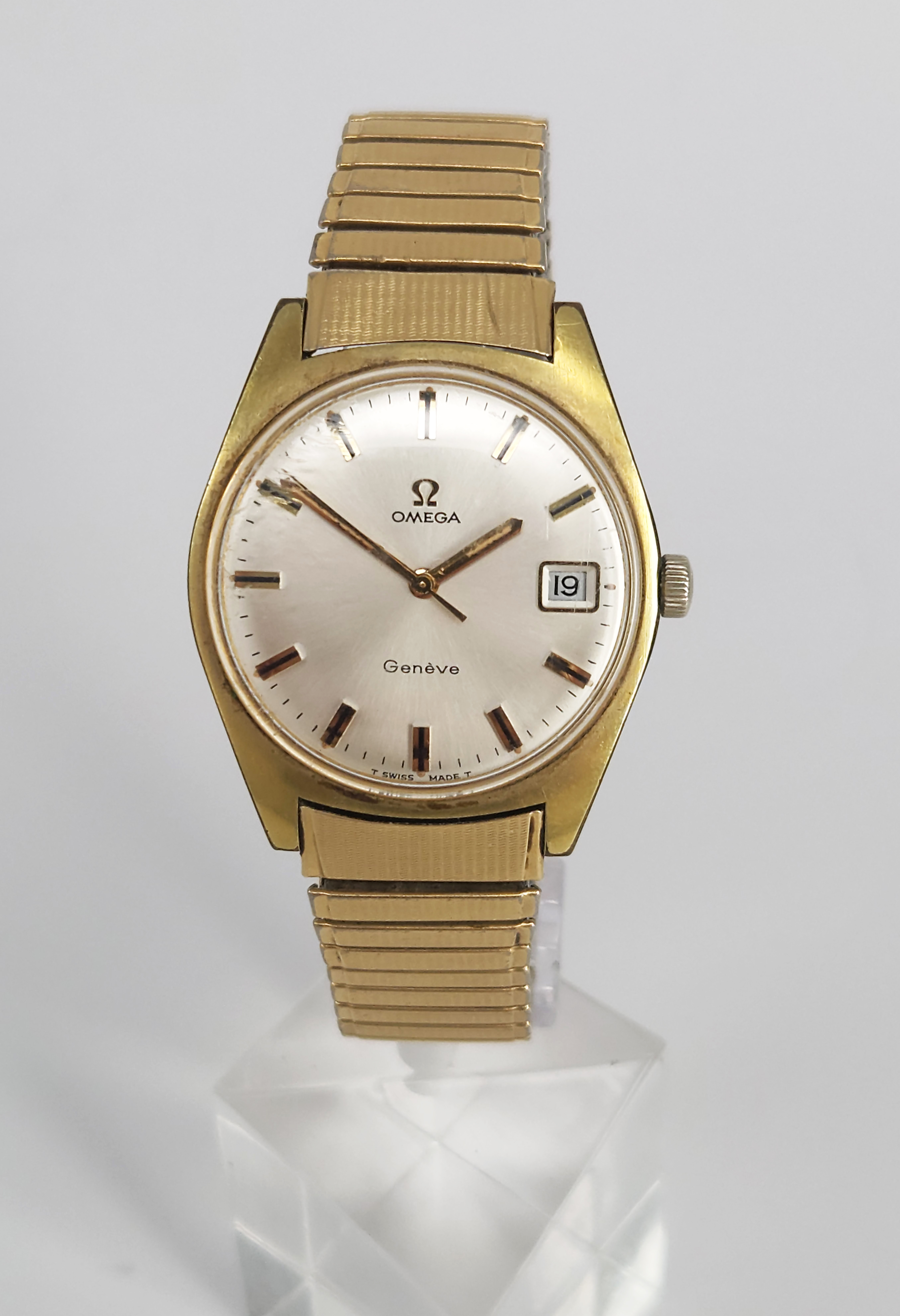 AN OEMGA GENEVE WRISTWATCH