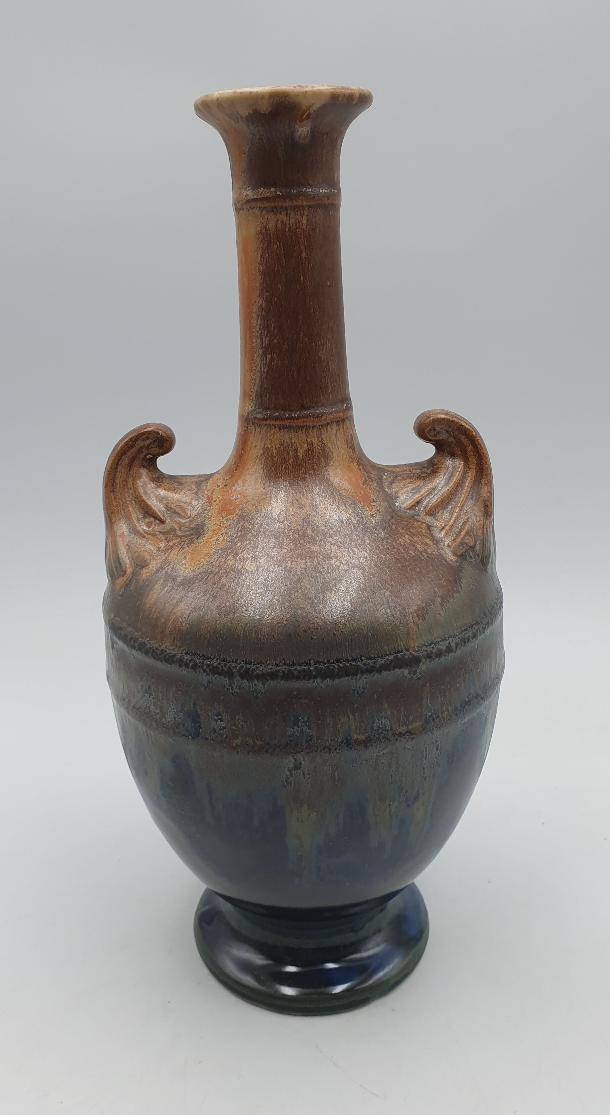 A FRENCH AMPHORA-SHAPED STONEWARE LIQUEUR DECANTER