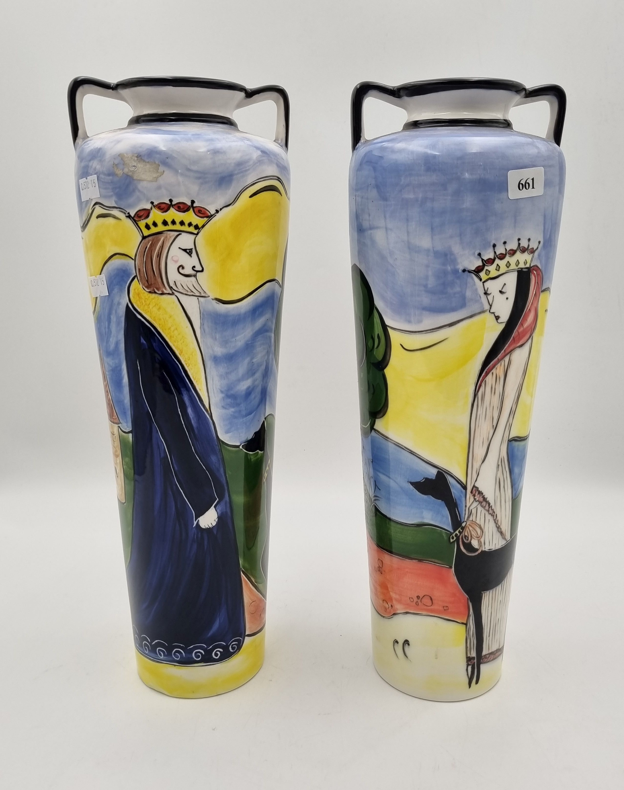 661 · A PAIR OF HAND PAINTED CERAMIC DOUBLE HANDLED VASES