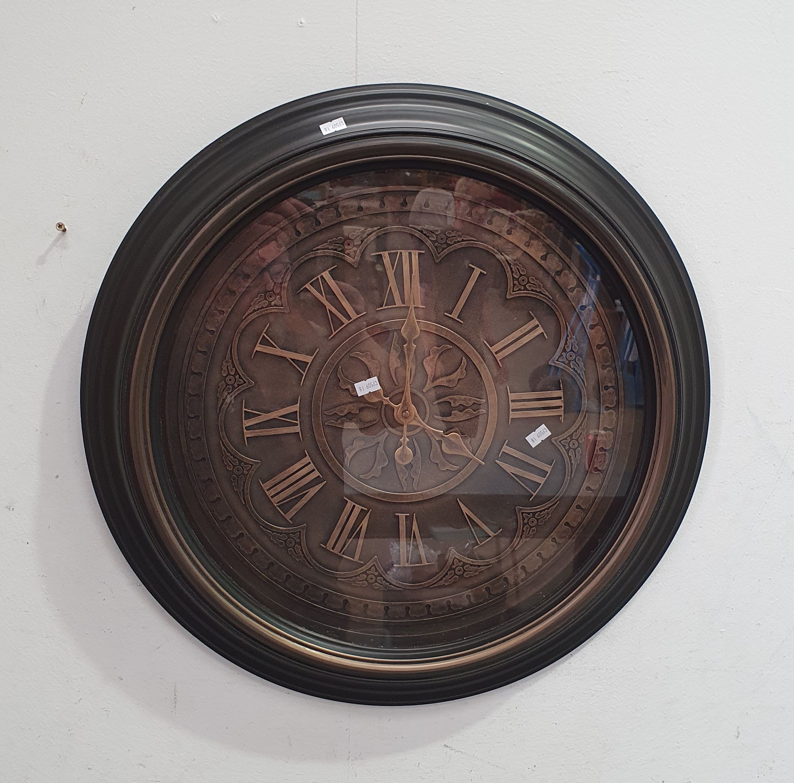 AN ALFRESCO WALL CLOCK