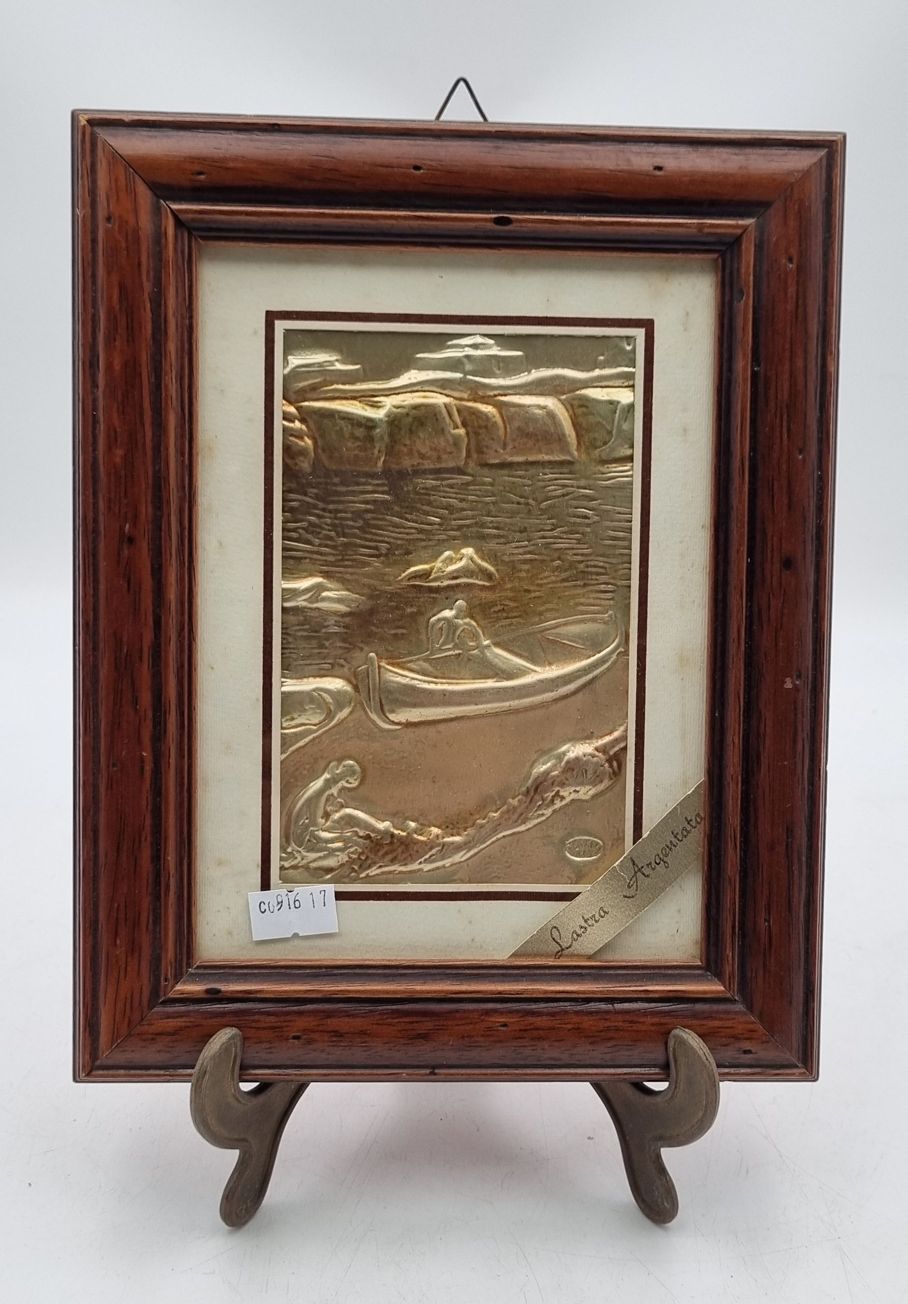 160 · AN ITALIAN SILVER EMBOSSED FRAMED IMAGE