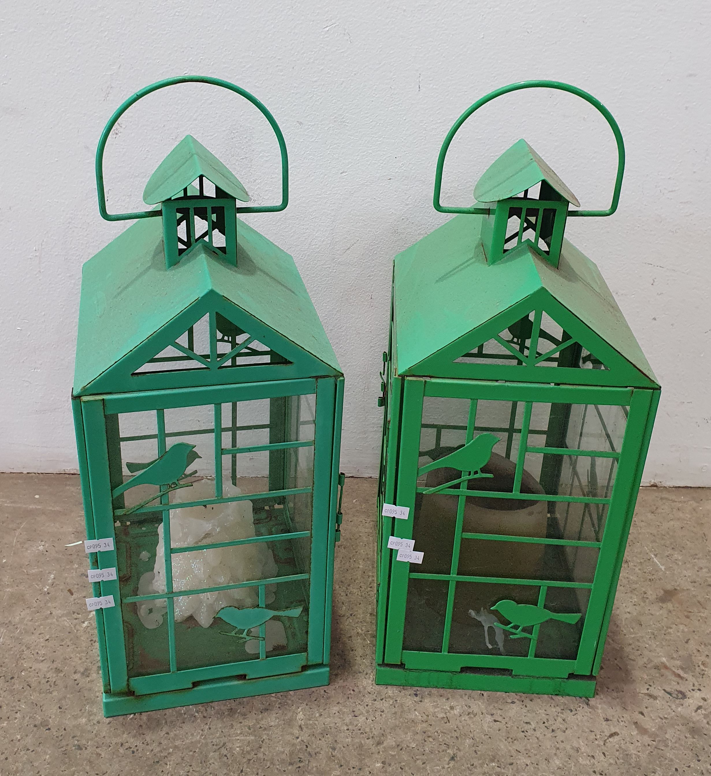 A Pair Of Metal Candle Holders