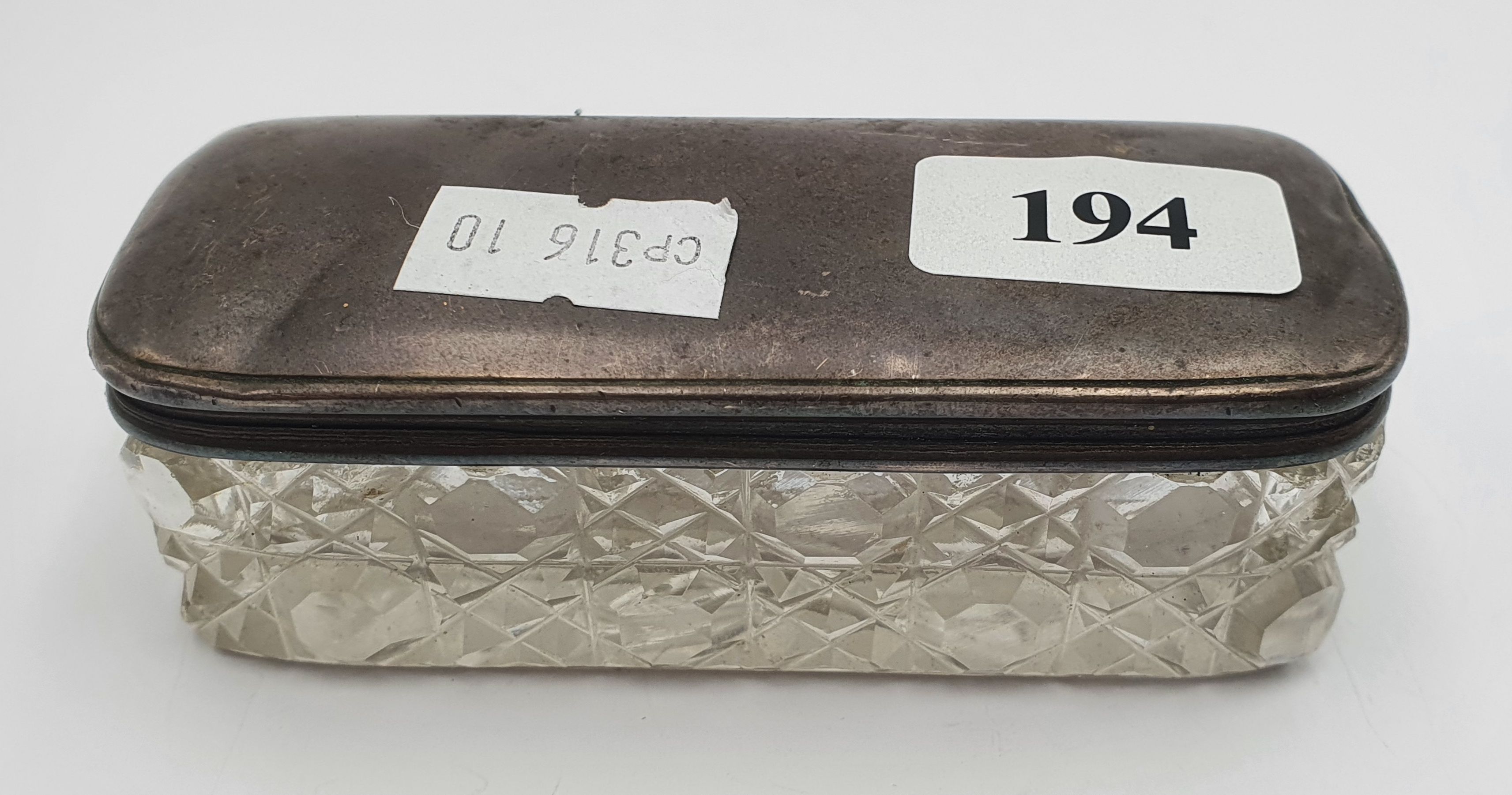 194 · A CUT GLASS DRESSING TABLE BOX WITH A STERLING SILVER LID