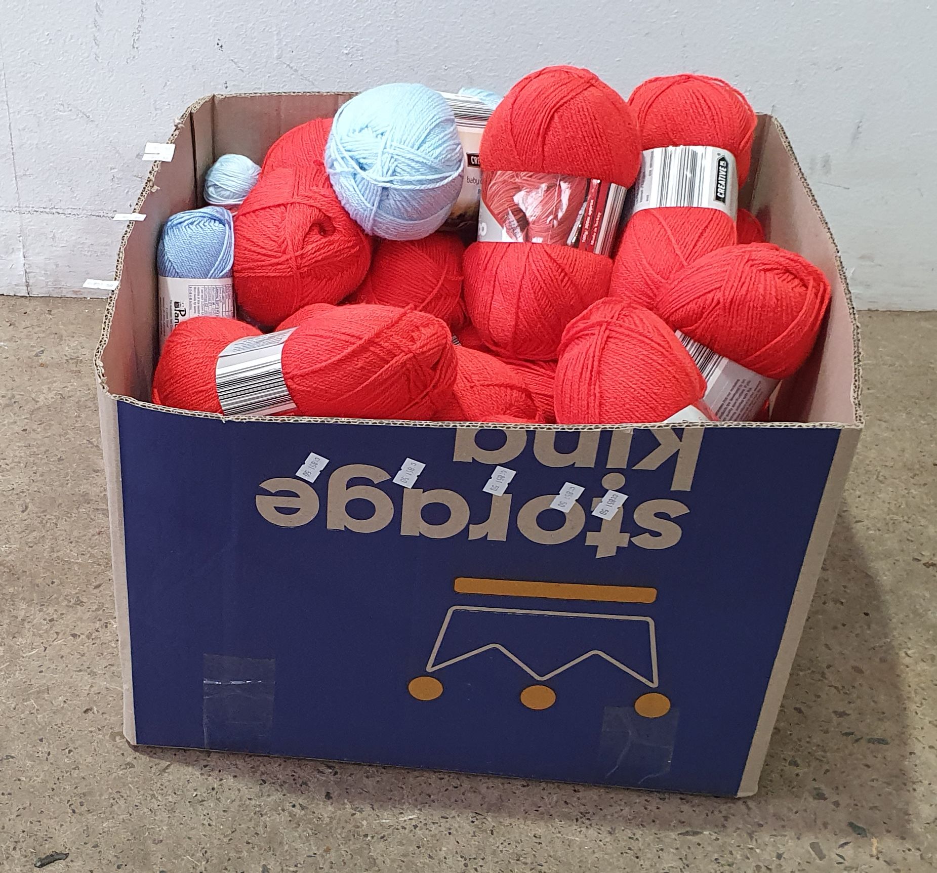 115 · A BOX OF ACRYLIC KNITTING YARN