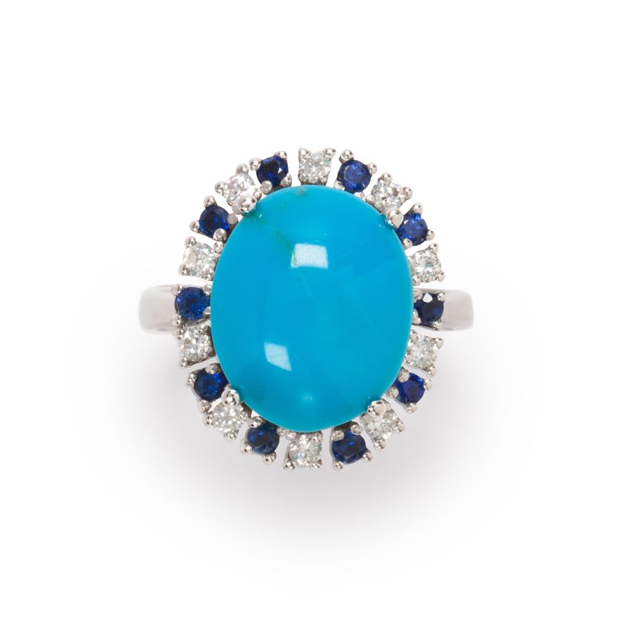 A turquoise, sapphire, diamond and fourteen karat white gold ring