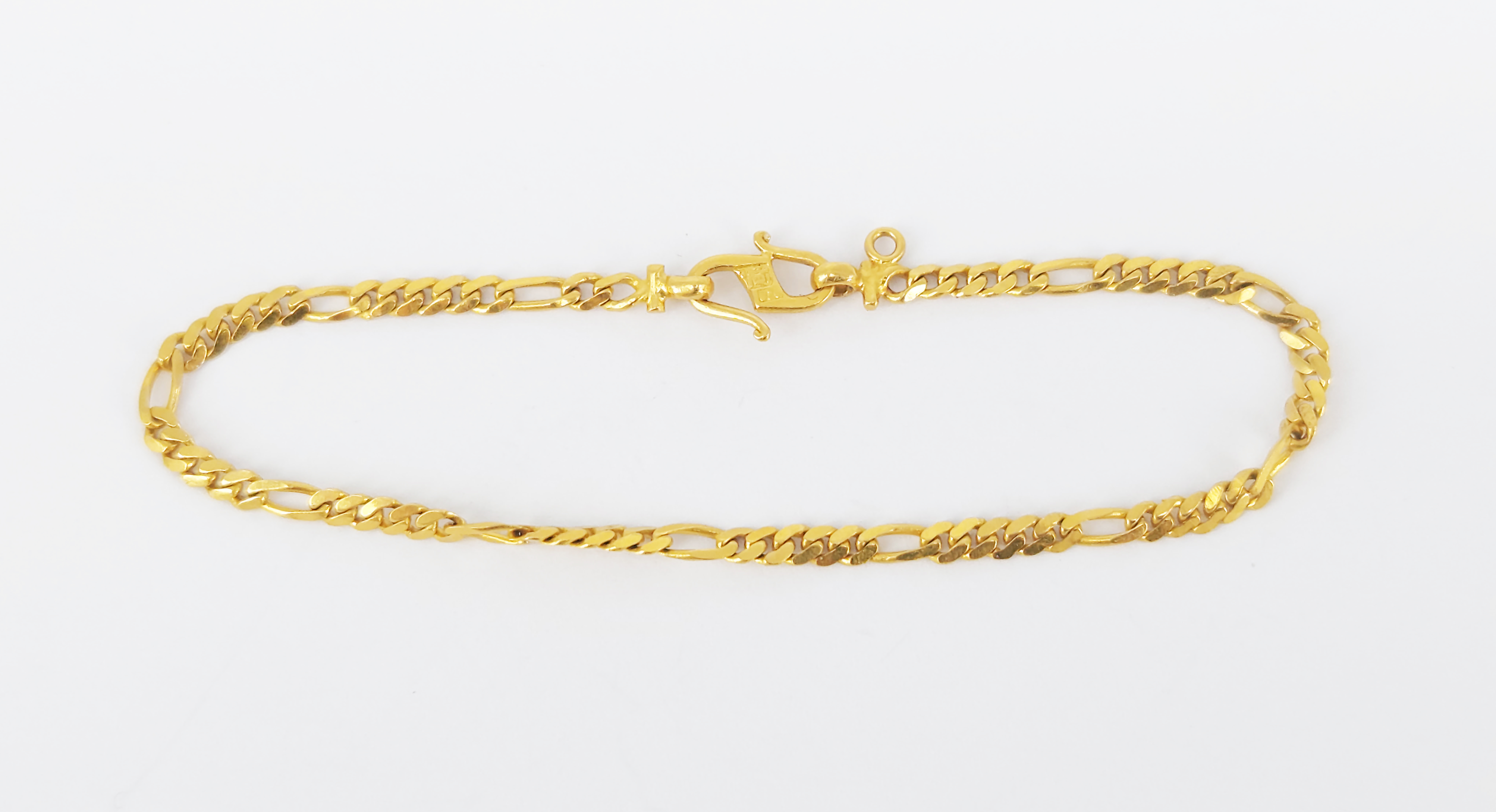An Asian Yellow Gold Long-And-Short Curb-Link Bracelet