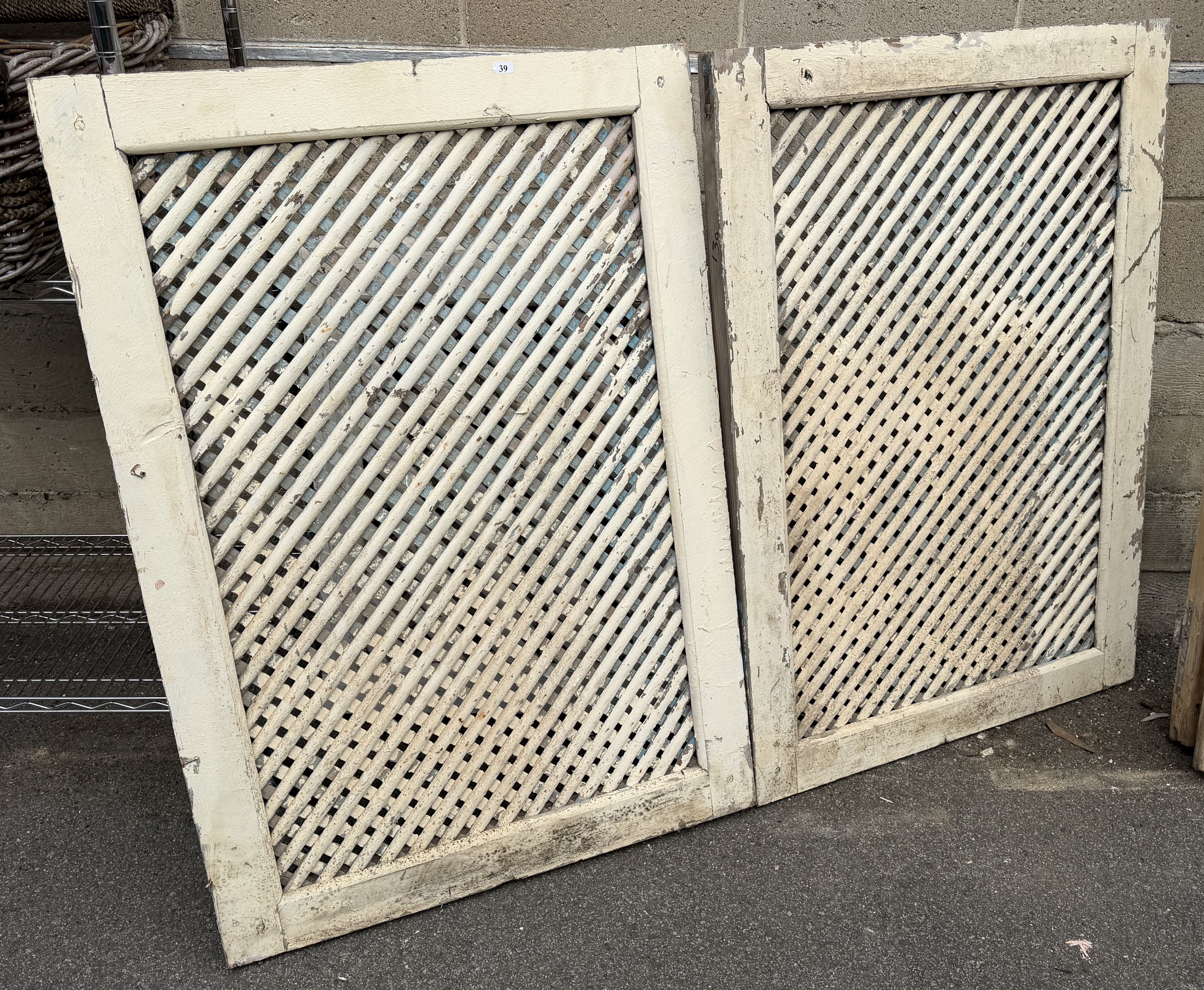 1119 · A PAIR OF RUSTIC WOODEN LATTICE PANELS