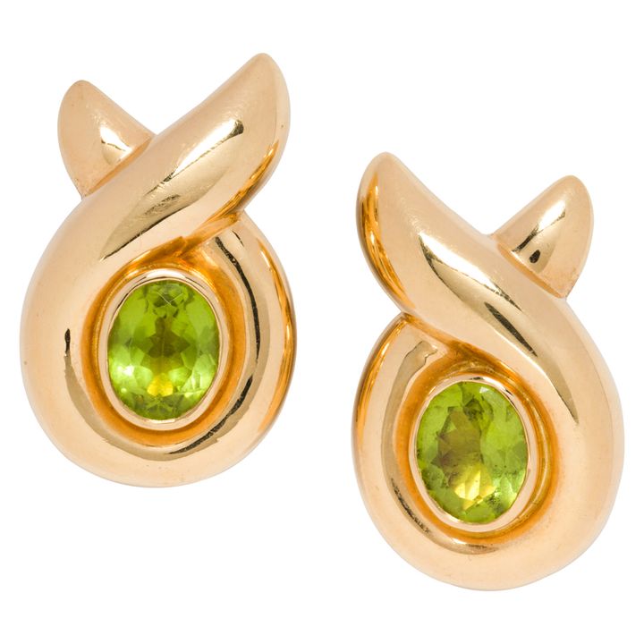 A pair of peridot and 18k gold ear clips