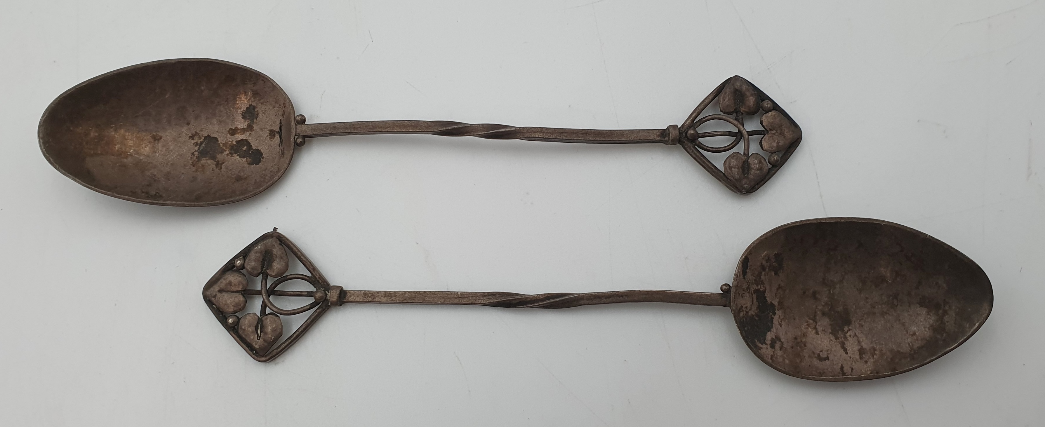 521 · A PAIR OF SILVER RHODA WAGER TEASPOONS