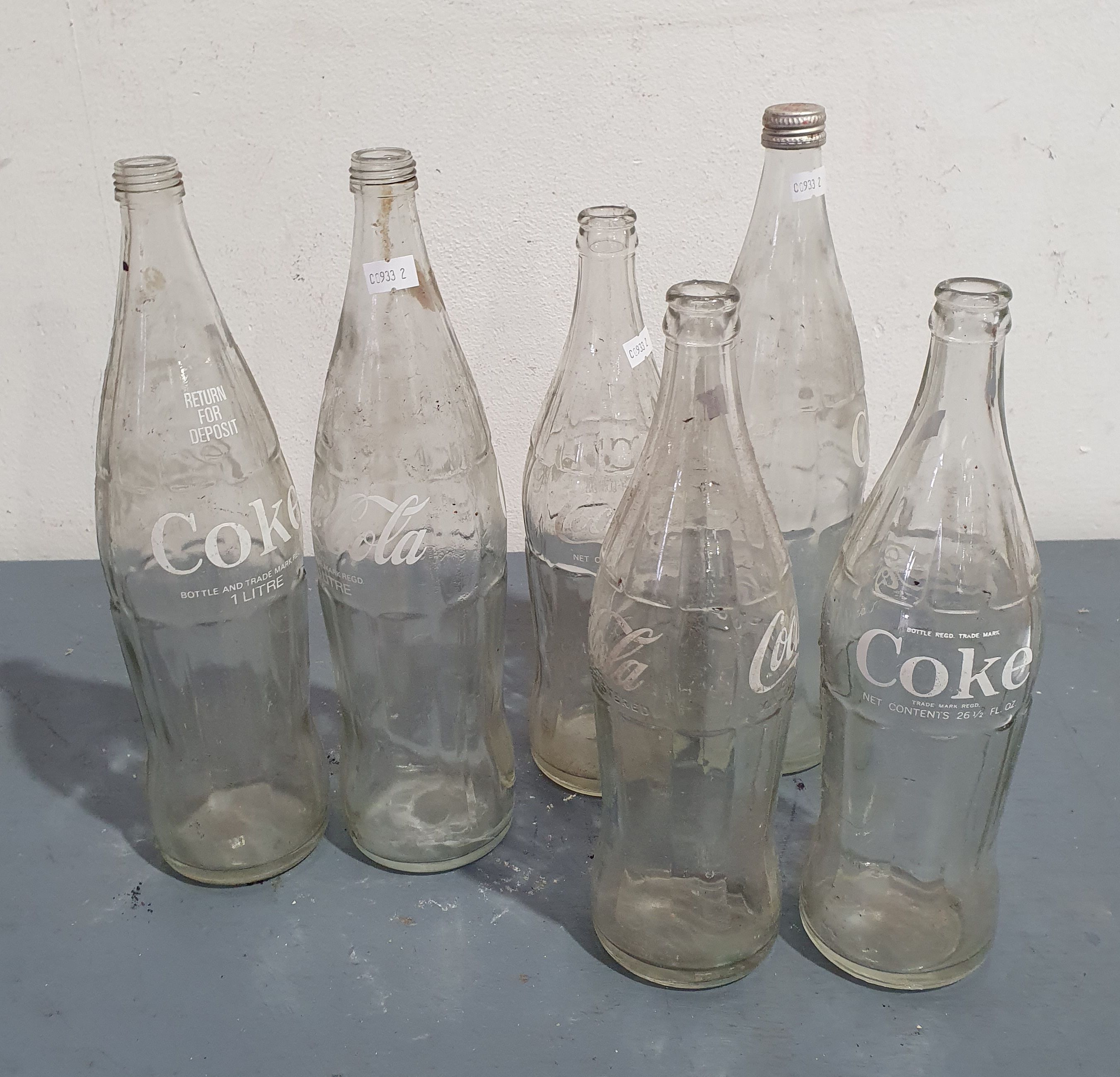 1248 · A COLLECTION OF OLD COKE BOTTLES