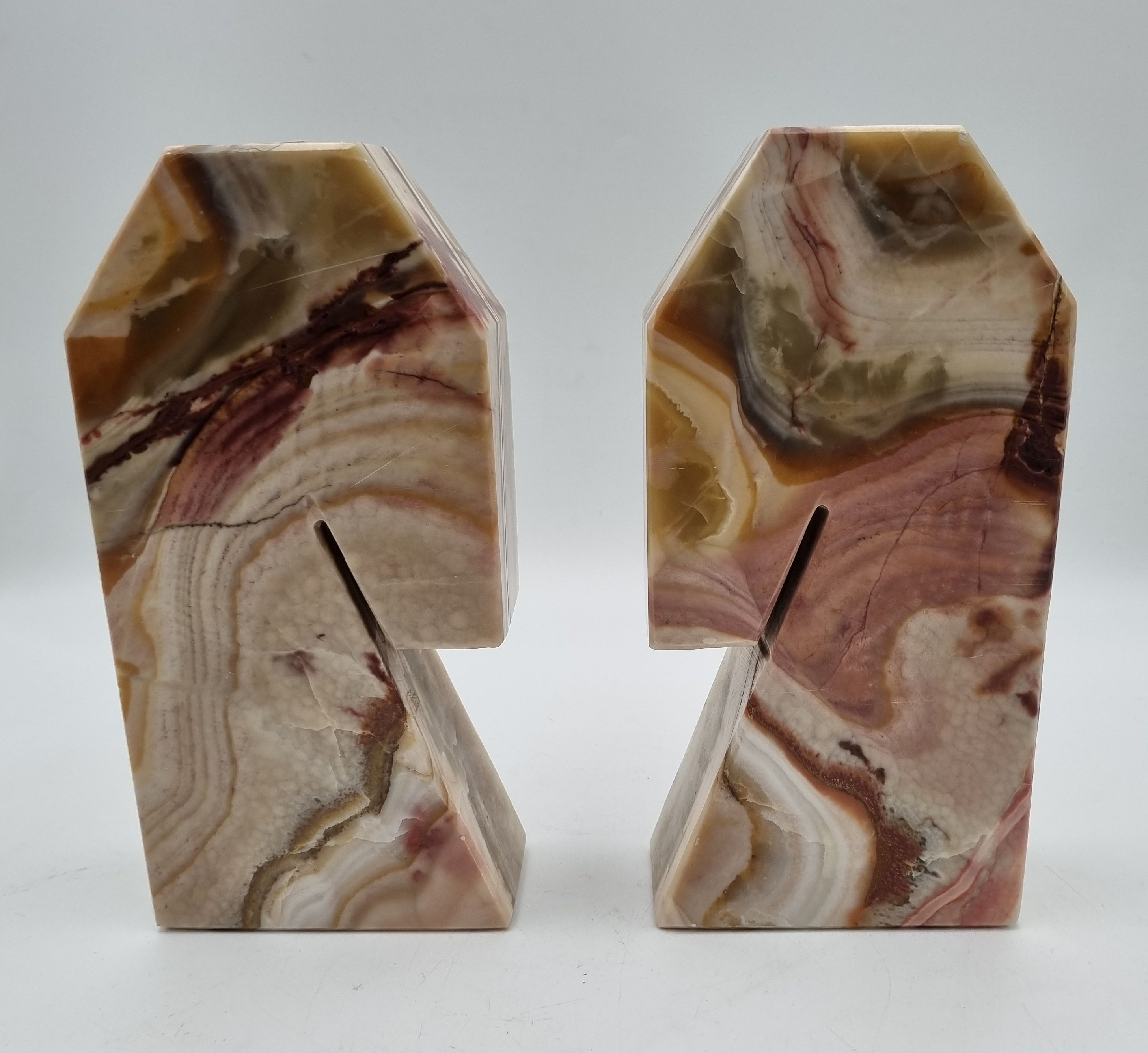 591 · A PAIR OF CARVED ONYX HORSE HEADS