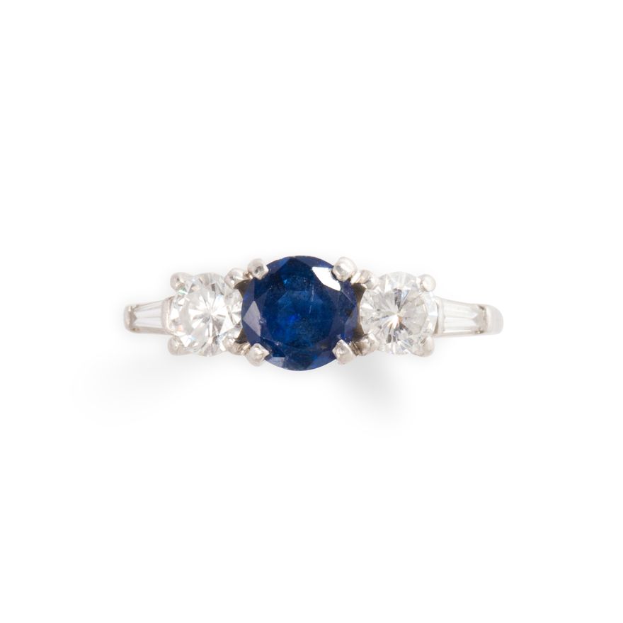 A sapphire, diamond and platinum ring
