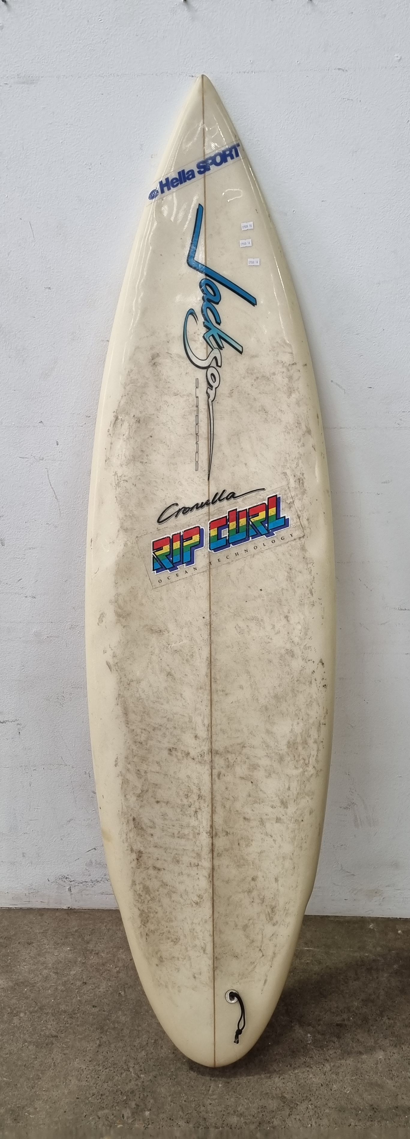 A Jackson Tri Fin Surfboard