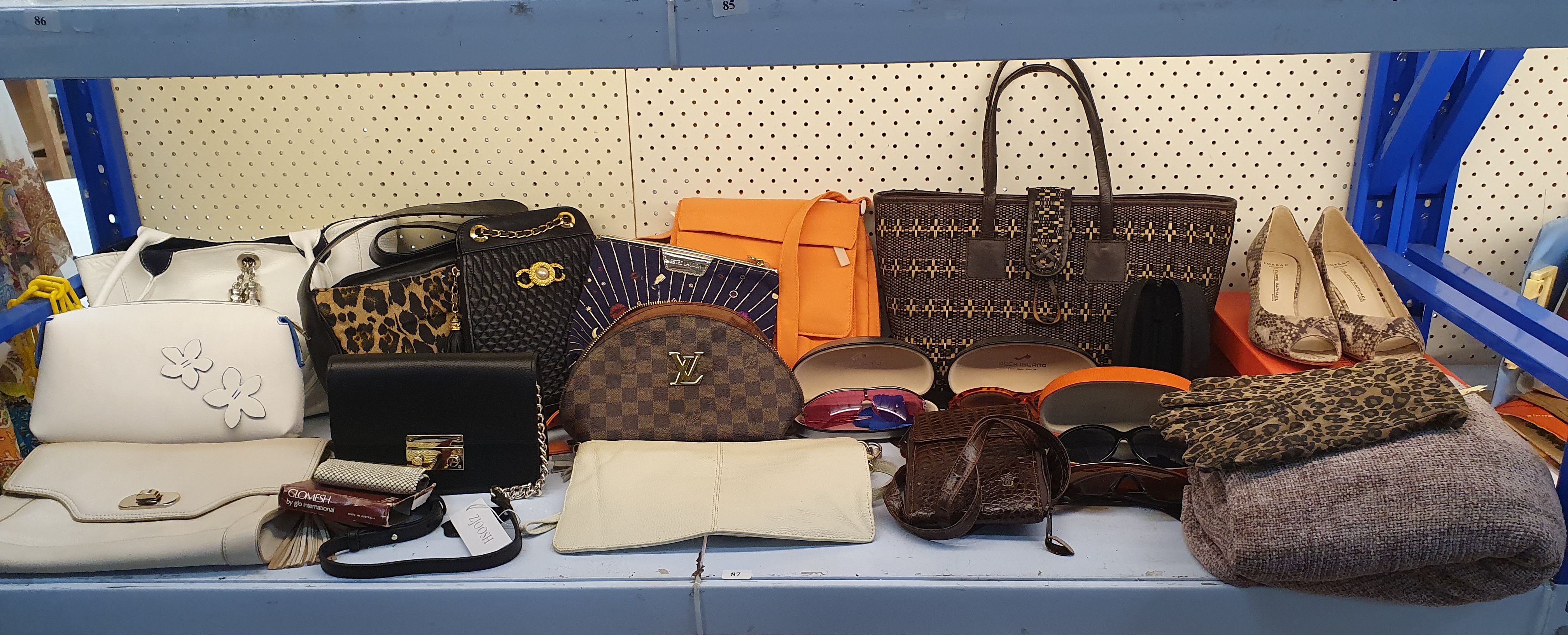 87 · A SHELF LOT OF LADIES DRESS ACCESSORIES