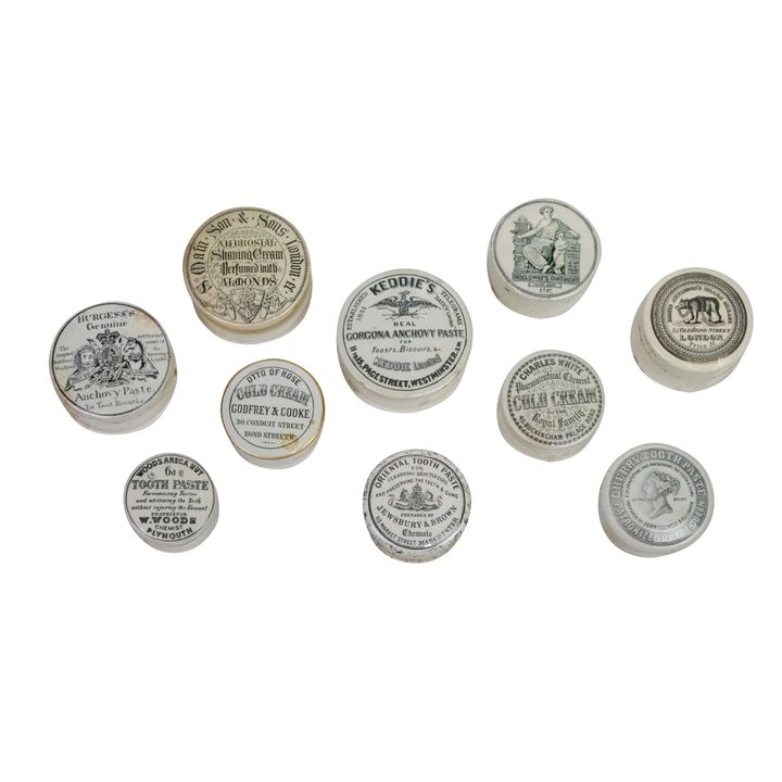 Ten English ironstone advertising pomade boxes