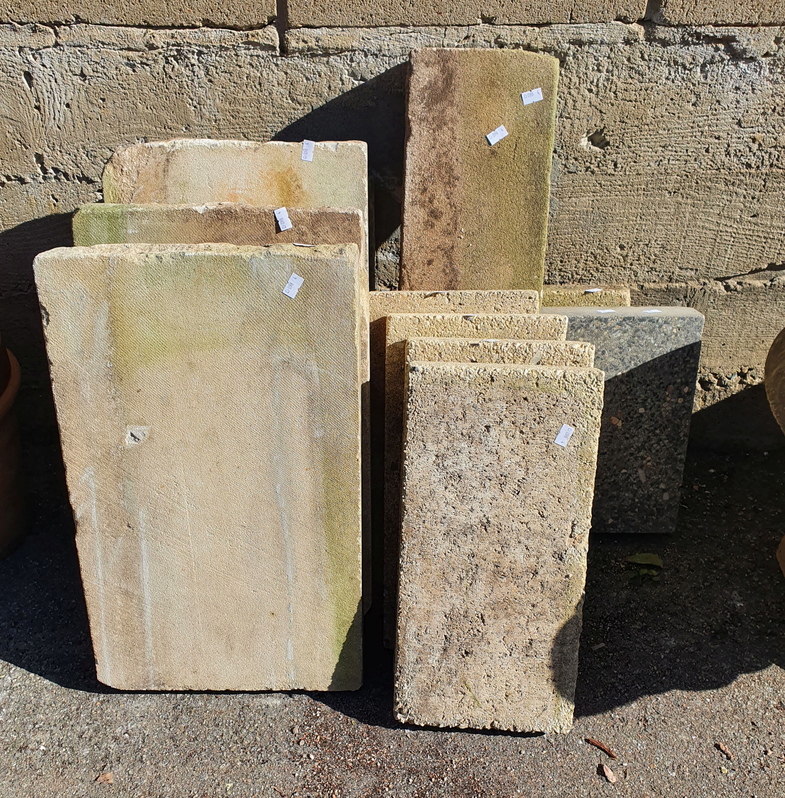 A Mixed Group Of Concrete And Stone Tiles