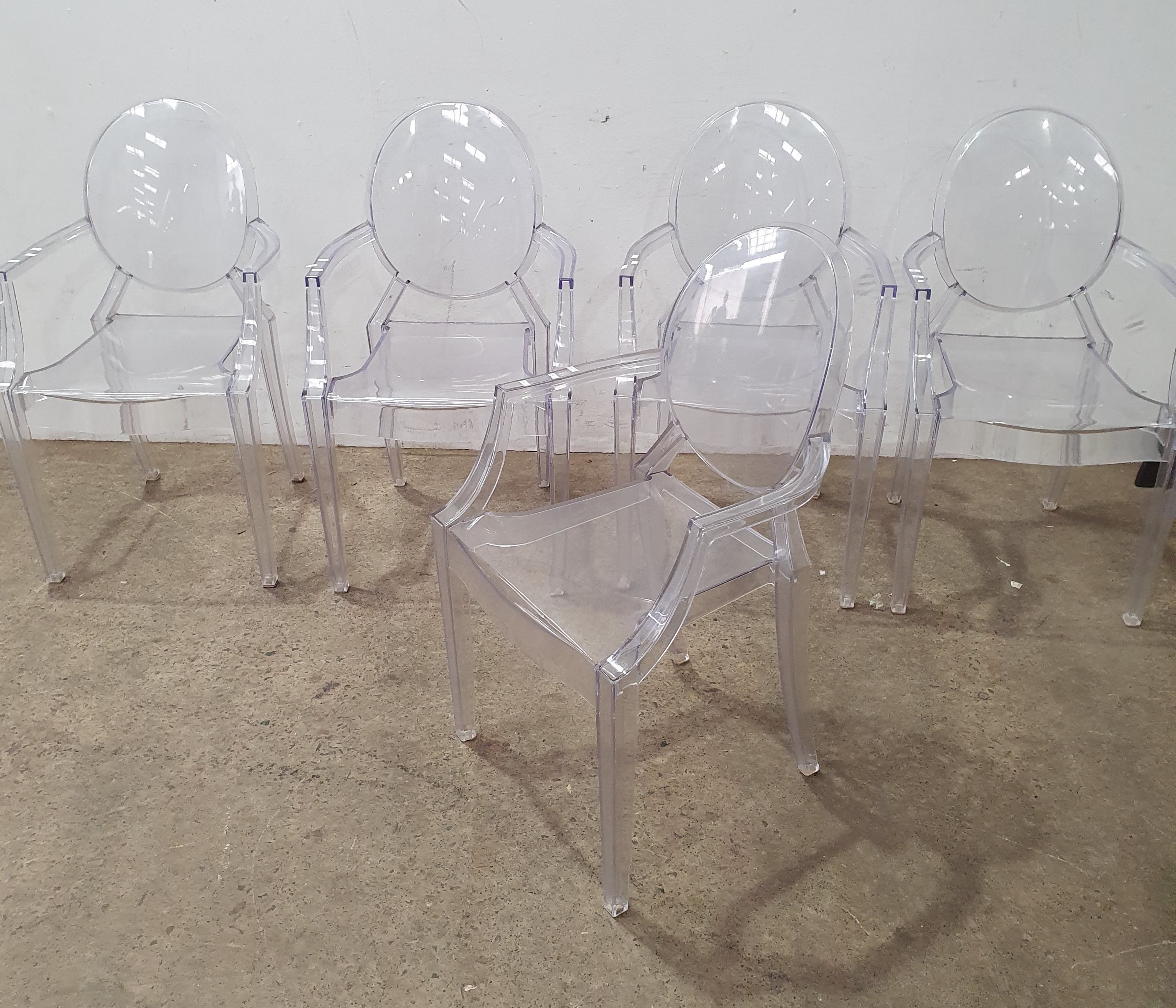 A SET OF FIVE GHOST ARMCHAIRS