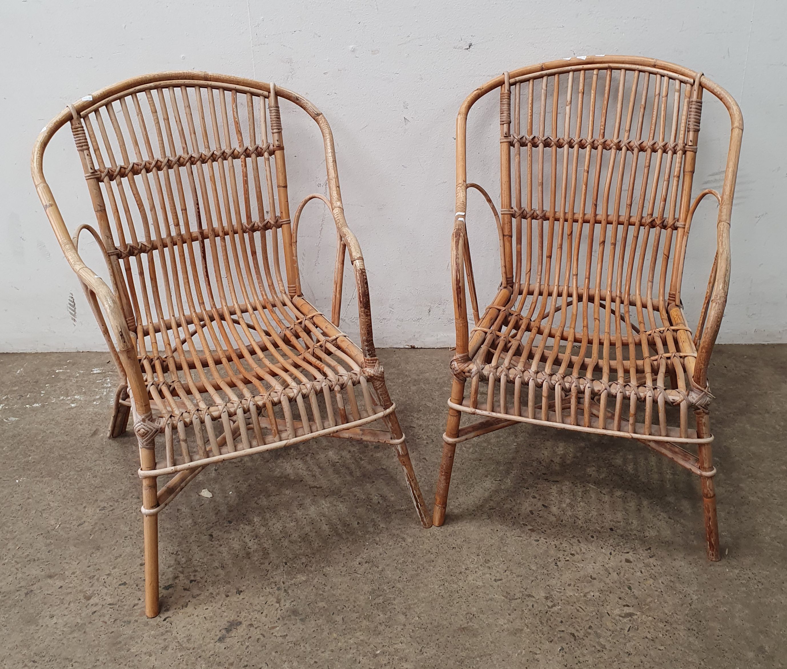 A Pair Of Cane Chairs