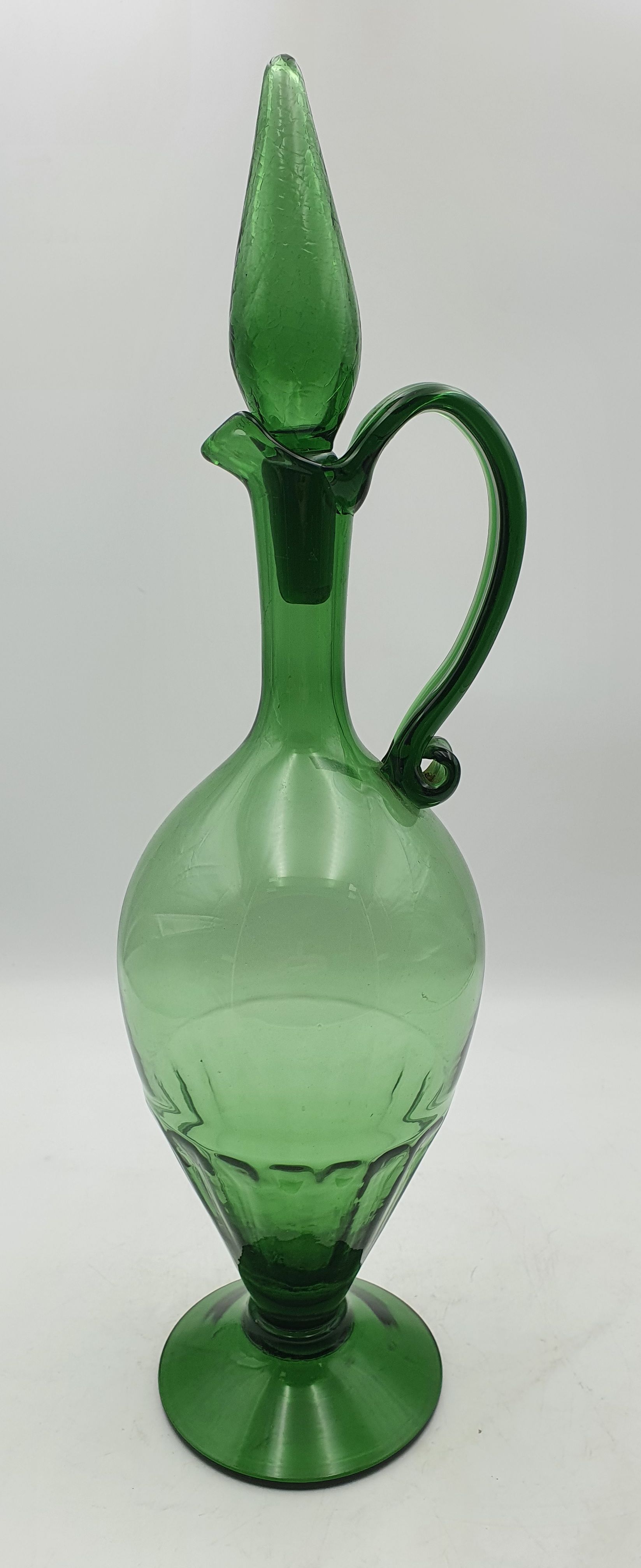 162 · A MID-CENTURY EMPOLI GREEN GLASS DECANTER