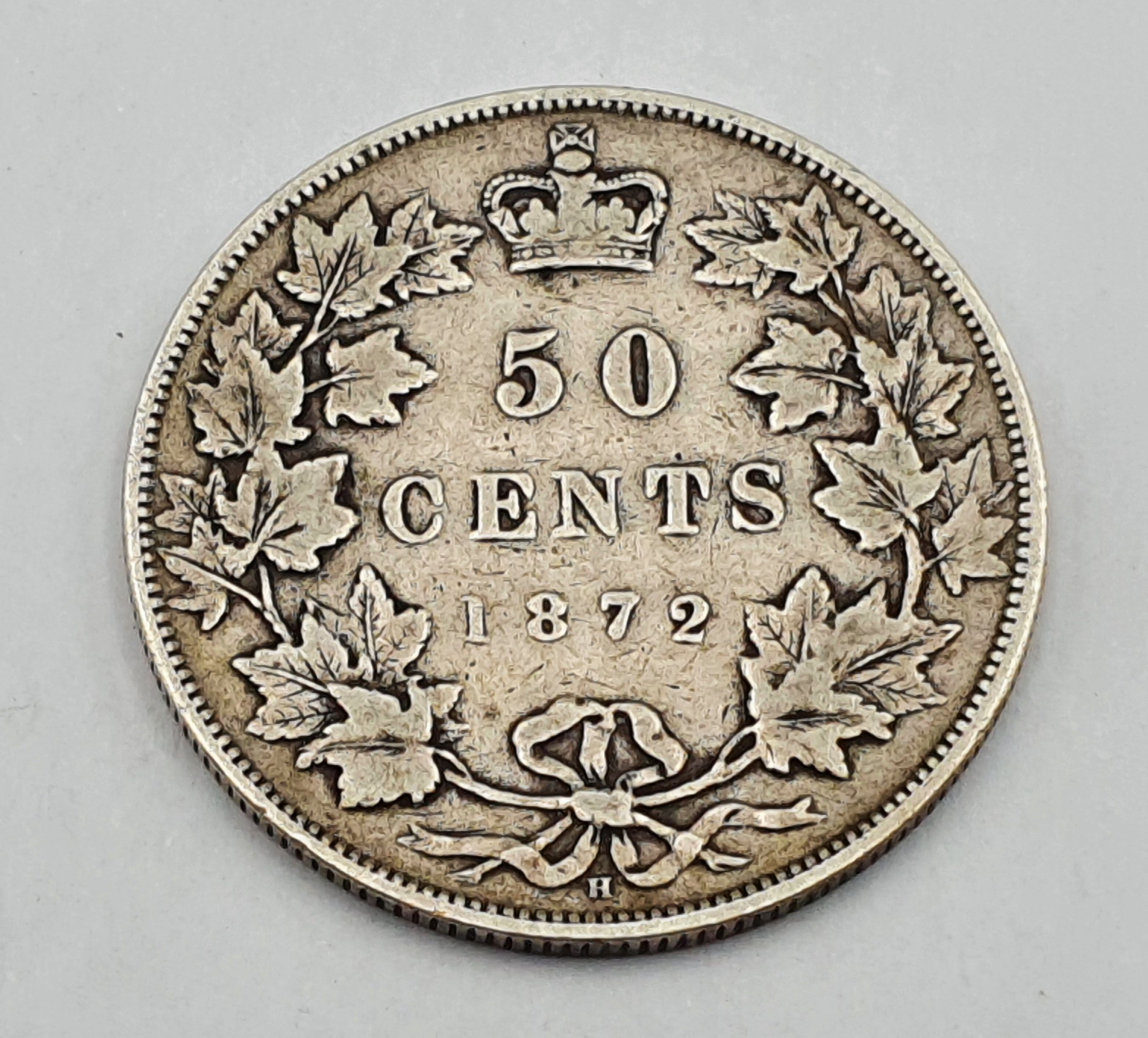 A CANADIAN SILVER 50 CENT